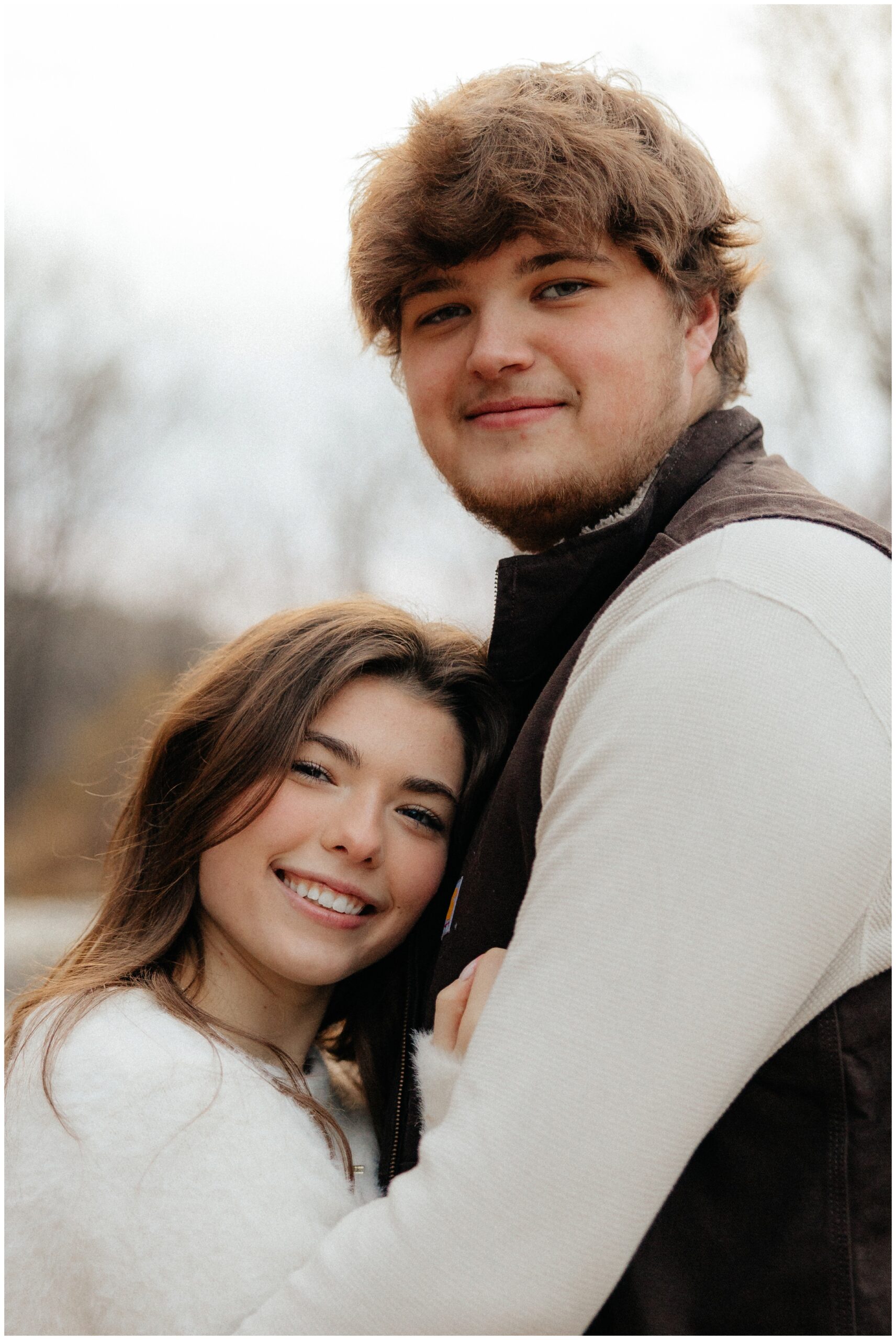 Micah and Hailey looking at the camera in a sweet pose.