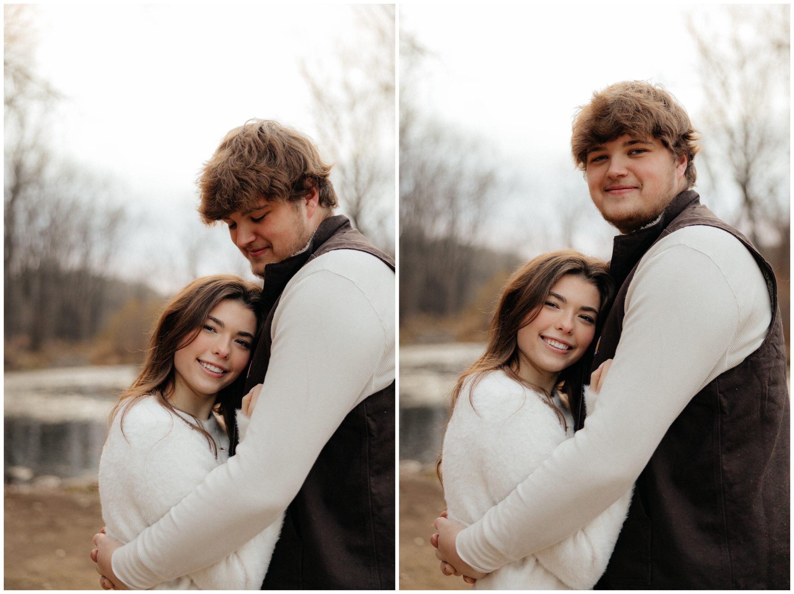 A couple standing face to face and looking at the camera with a creek in the background.