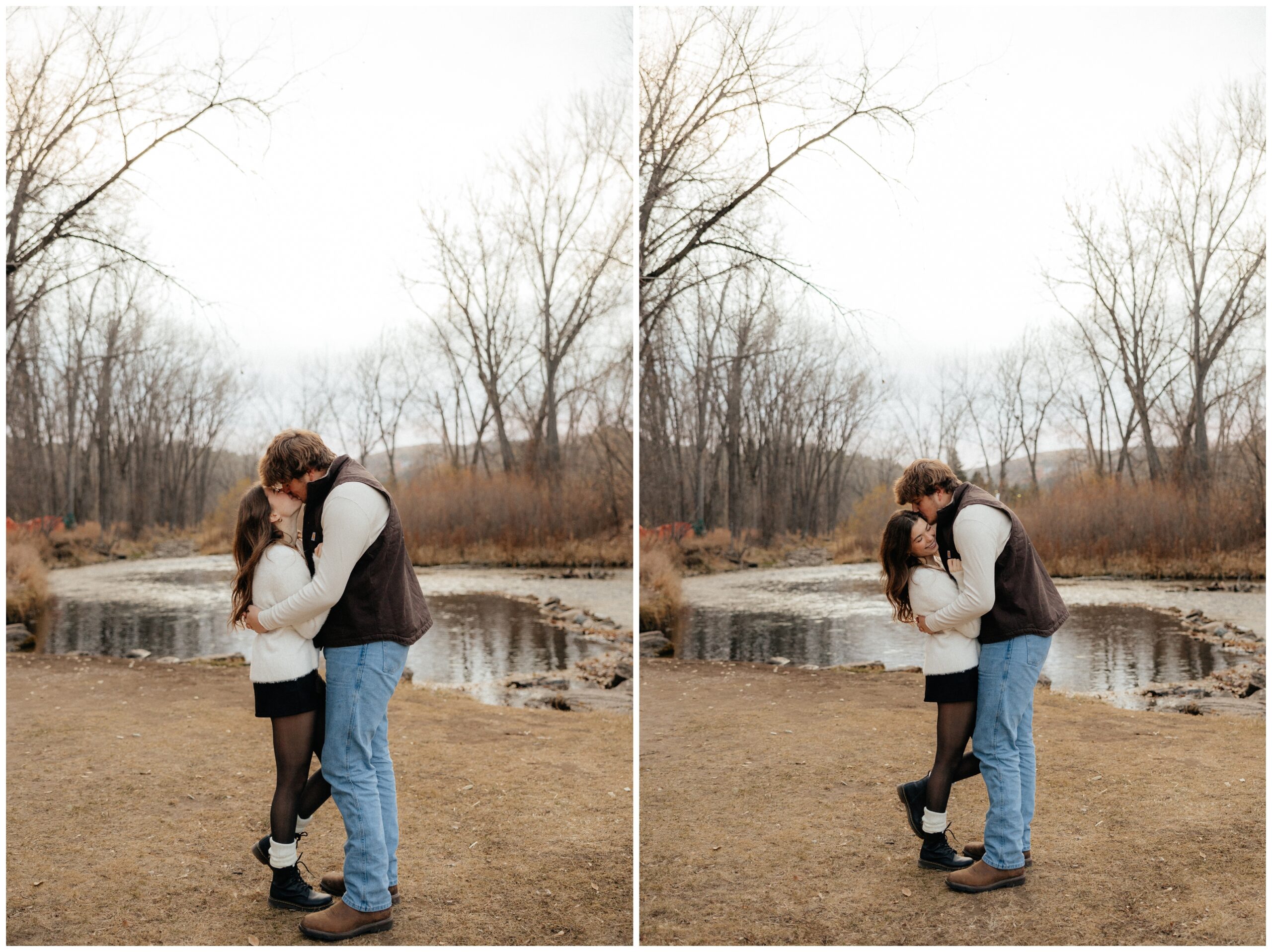 A couple kissing in front of a creek.