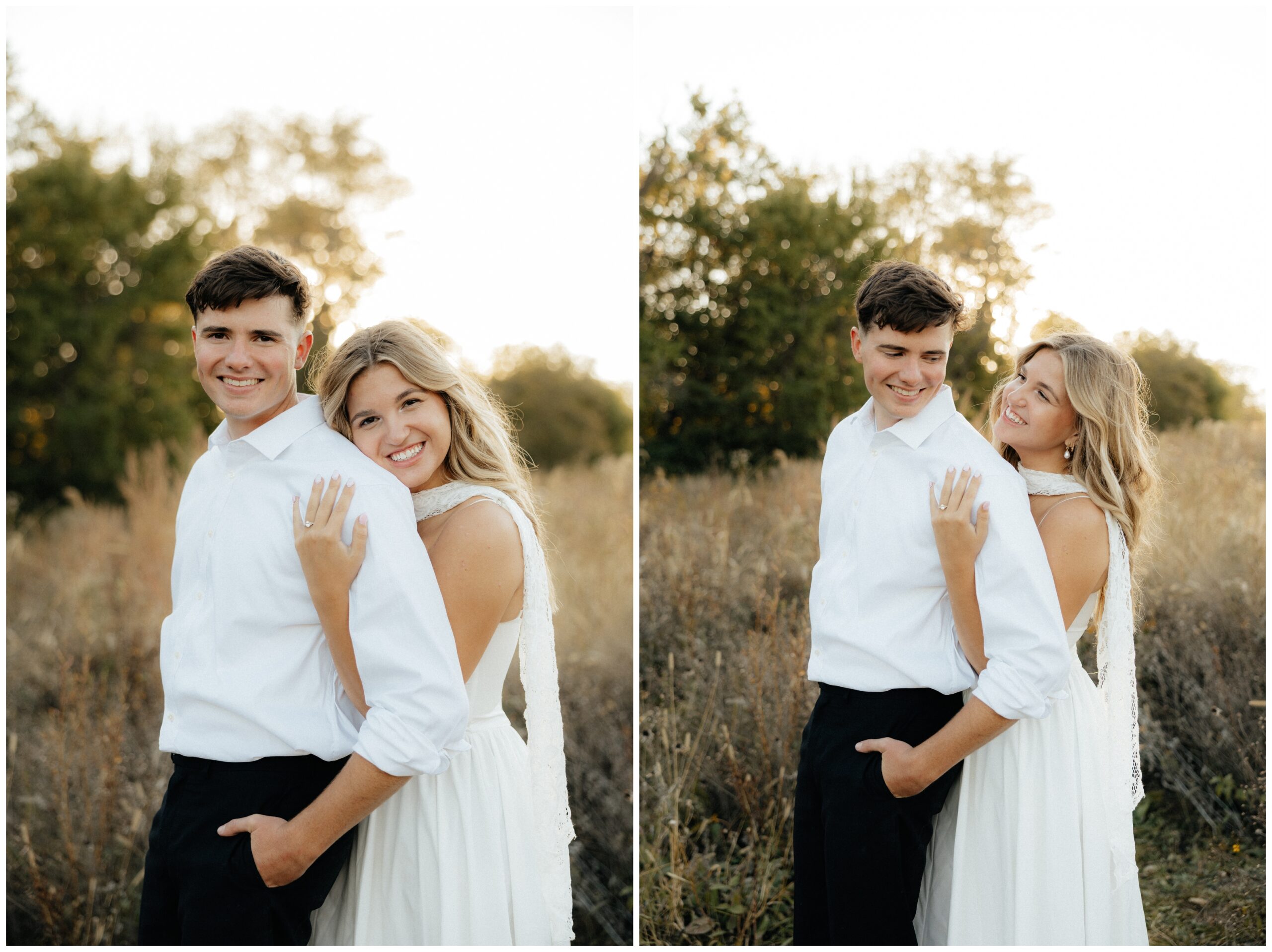 A couple smiling at the camera in a stunning field location.