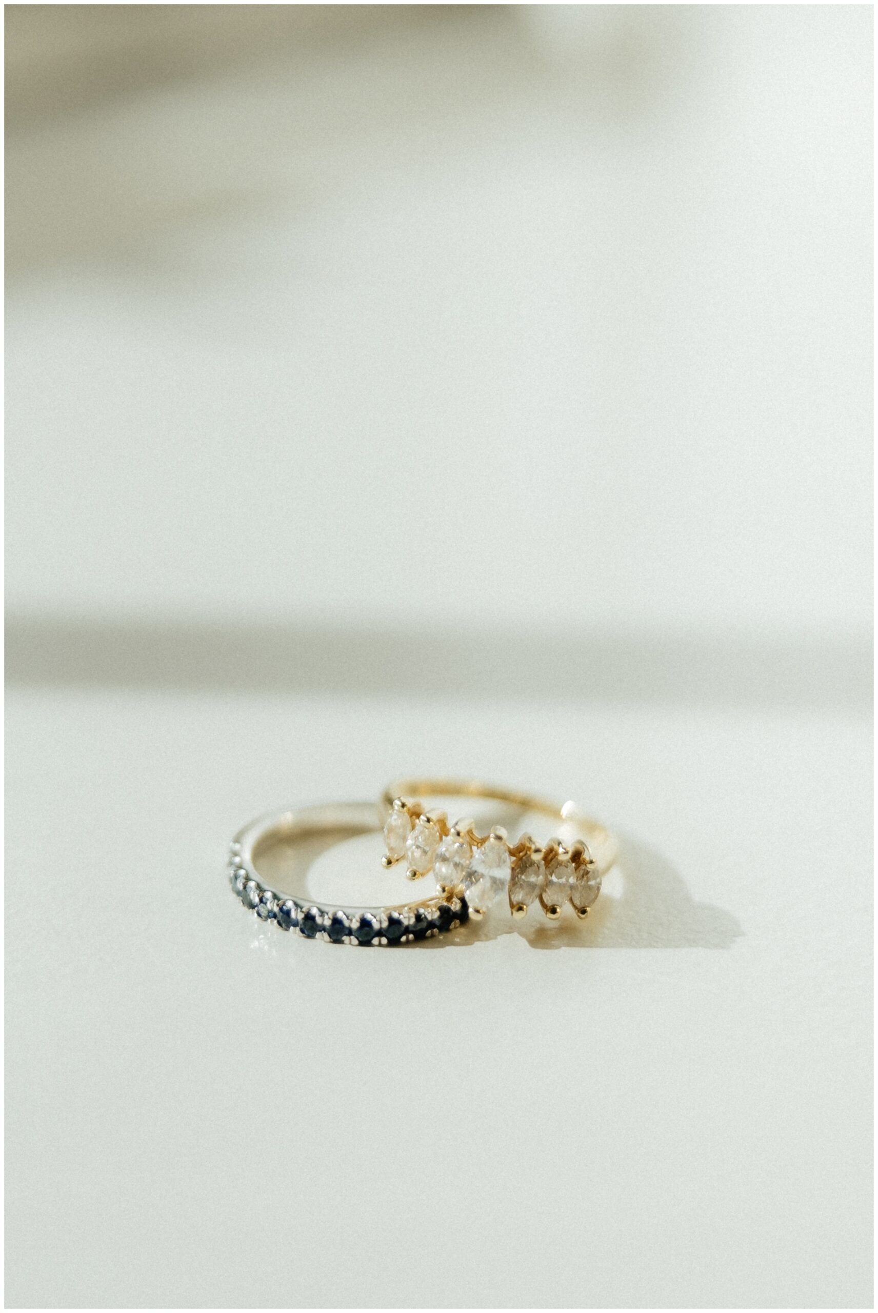 The bride's grandmother's wedding bands for something borrowed and something blue.