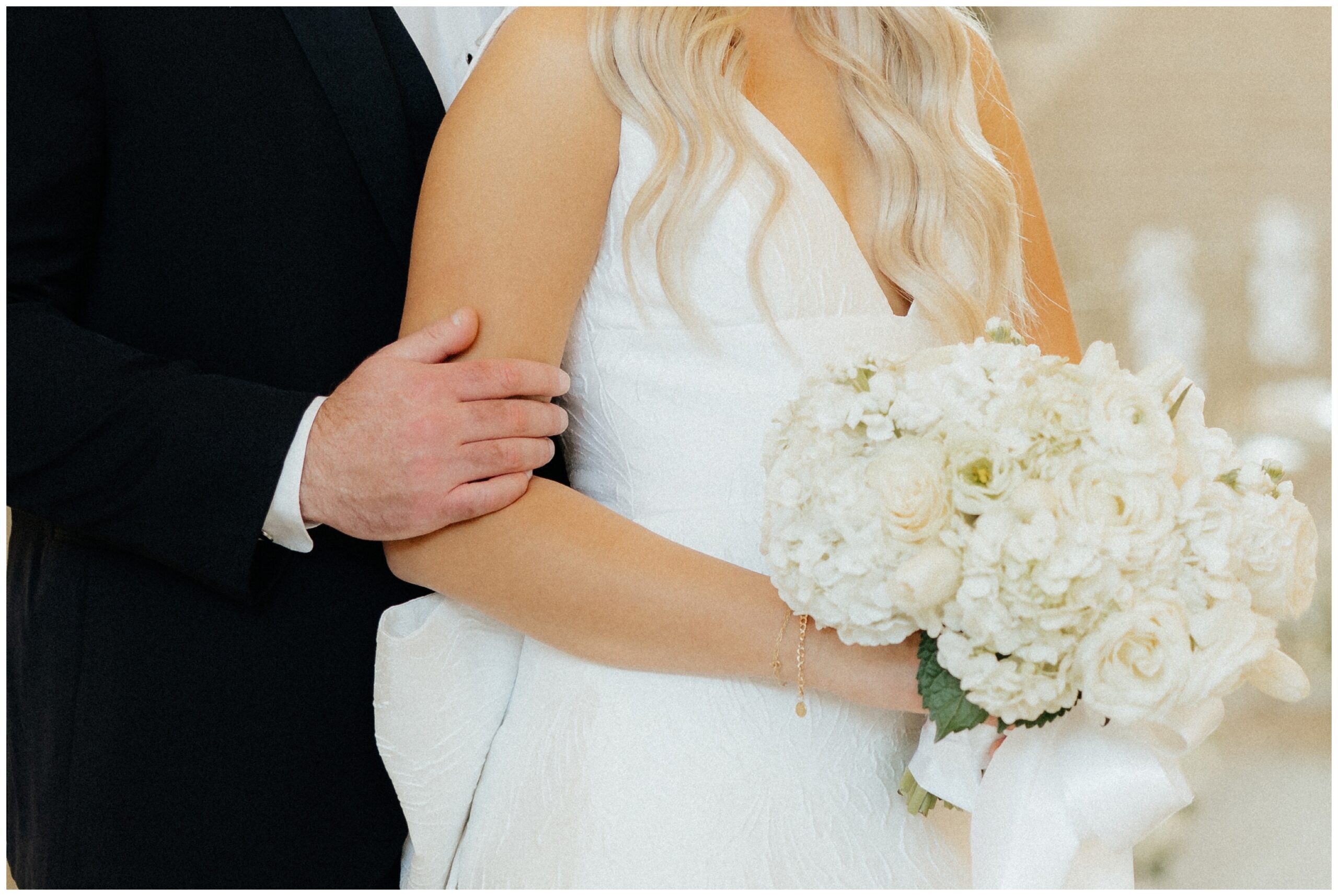 Close up detail of bride and groom portrait.