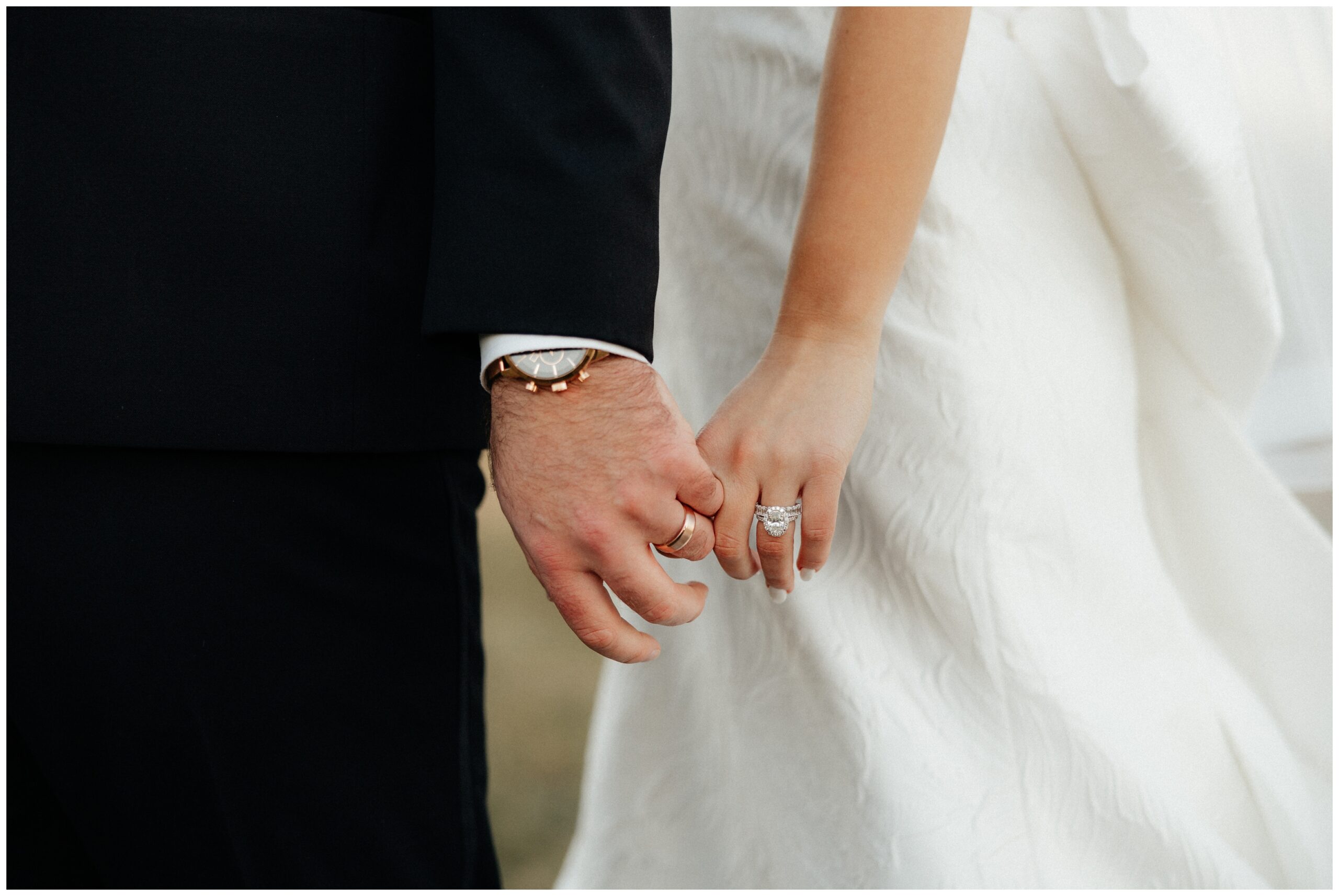 Couple holding hands