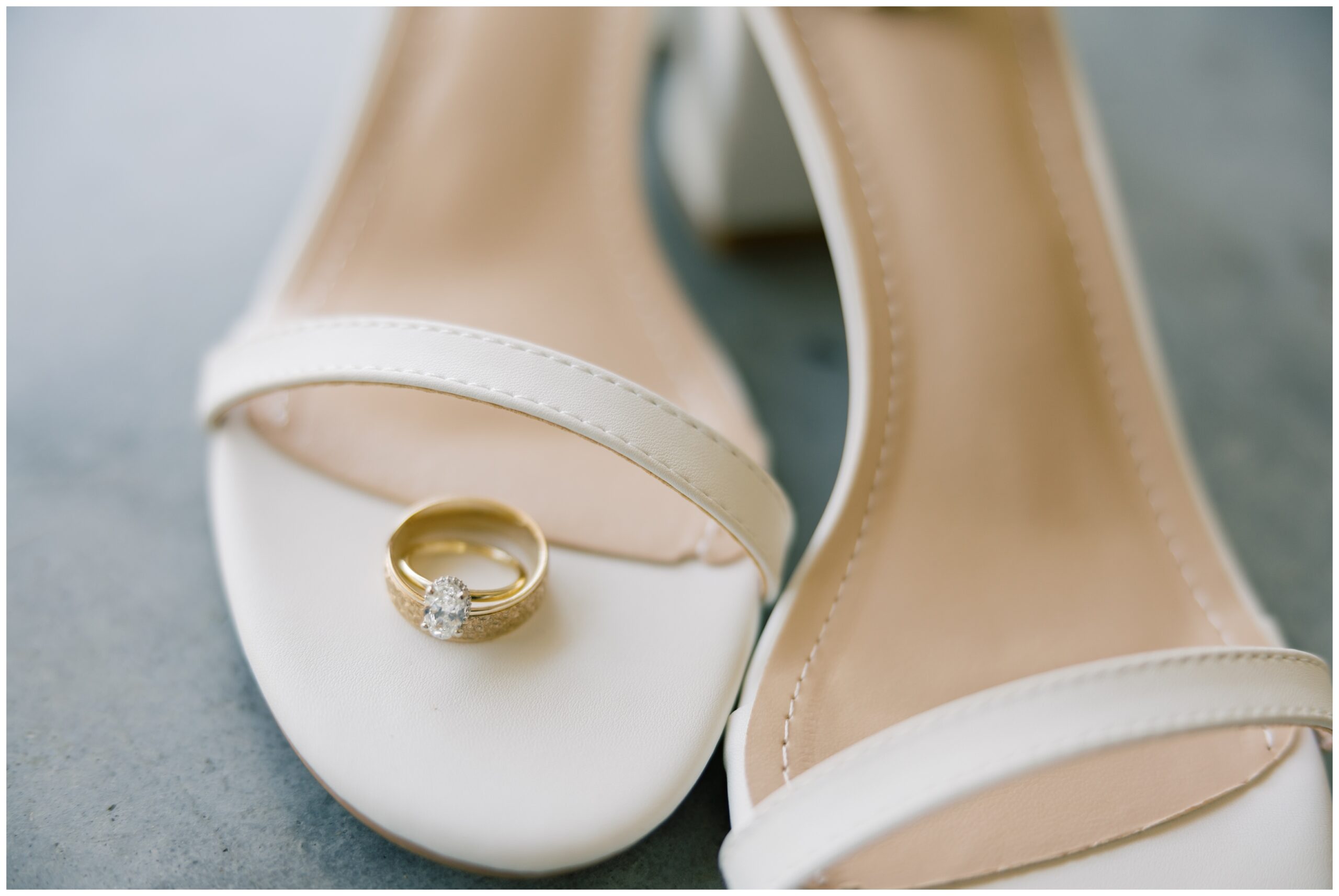 Wedding bands on the brides shoes.