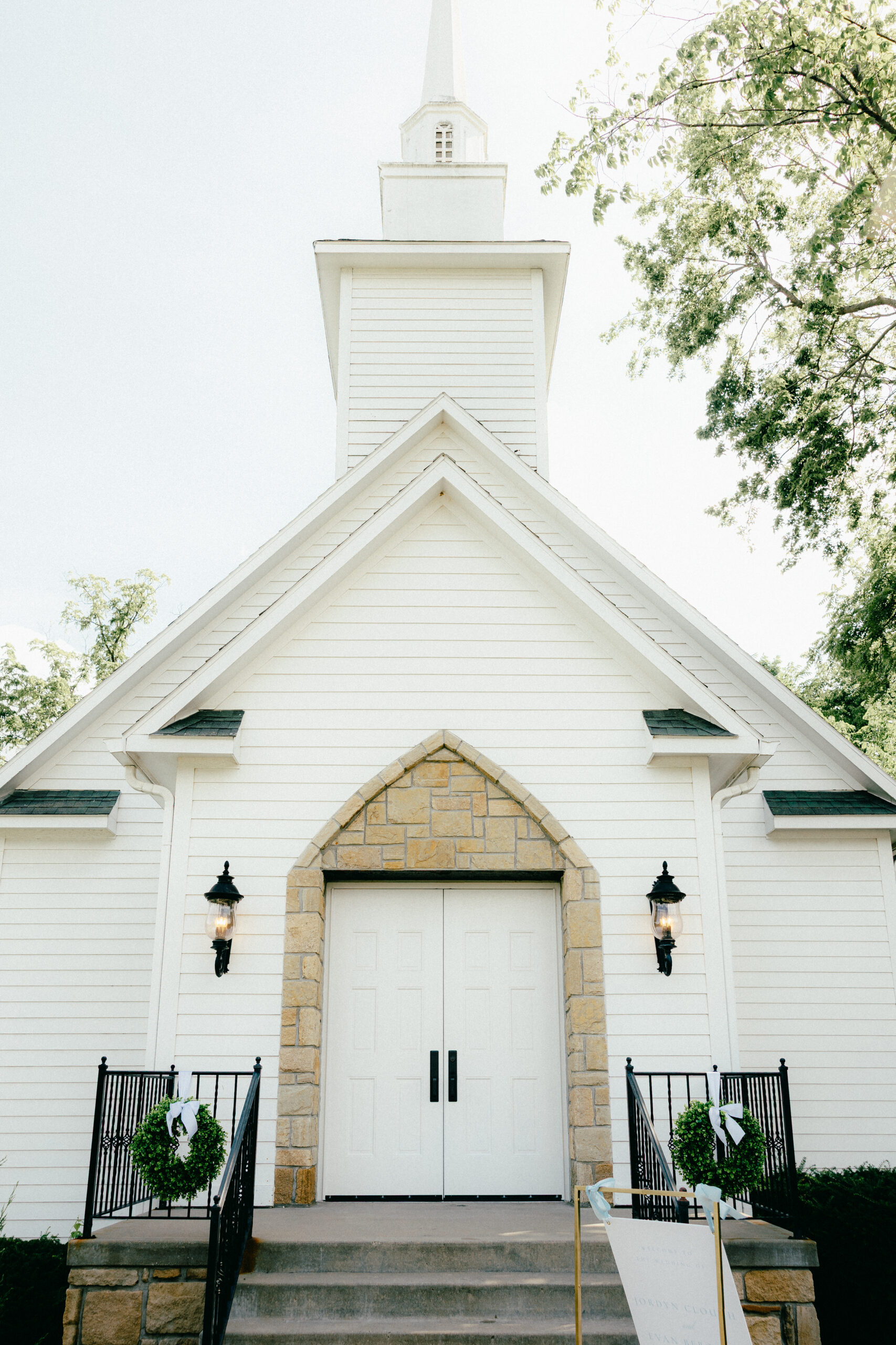 A white chapel on a wedding day.