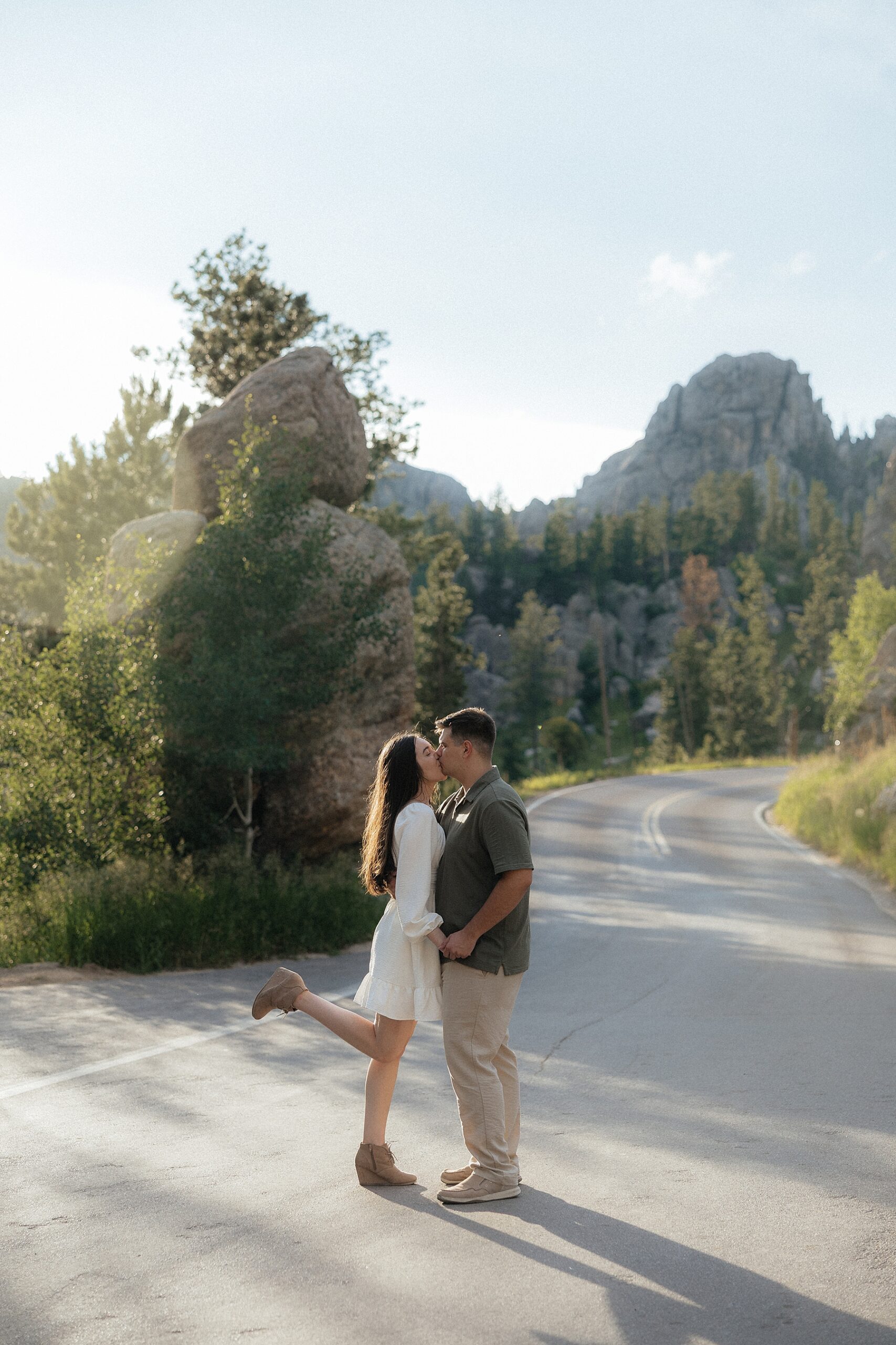 Emily + Harrison kissing on Needle's Highway.