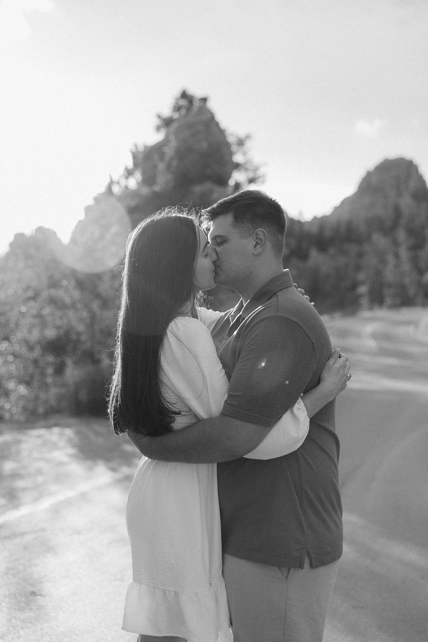 Emily + Harrison kissing on Needle's Highway.