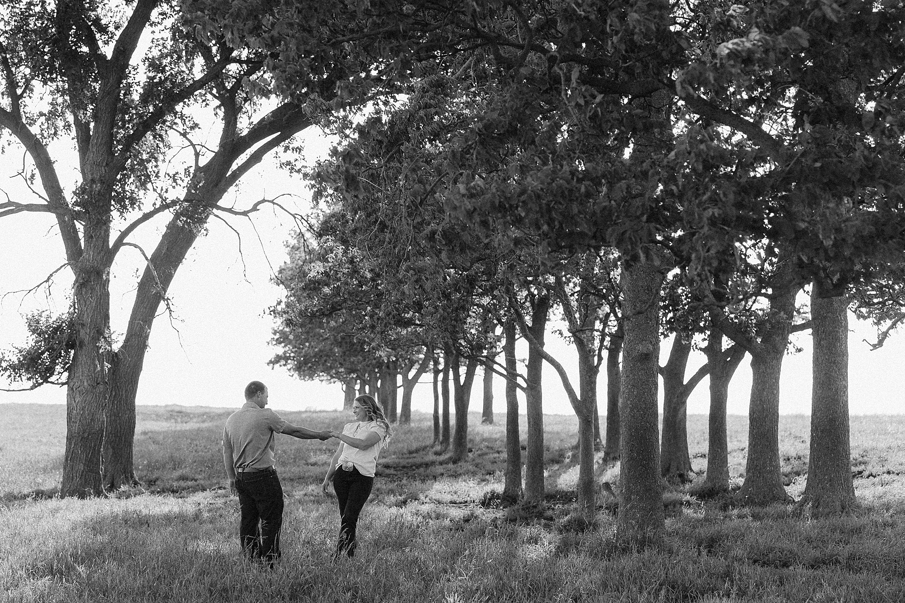 A couple having a playful moment in Brookings, SD.