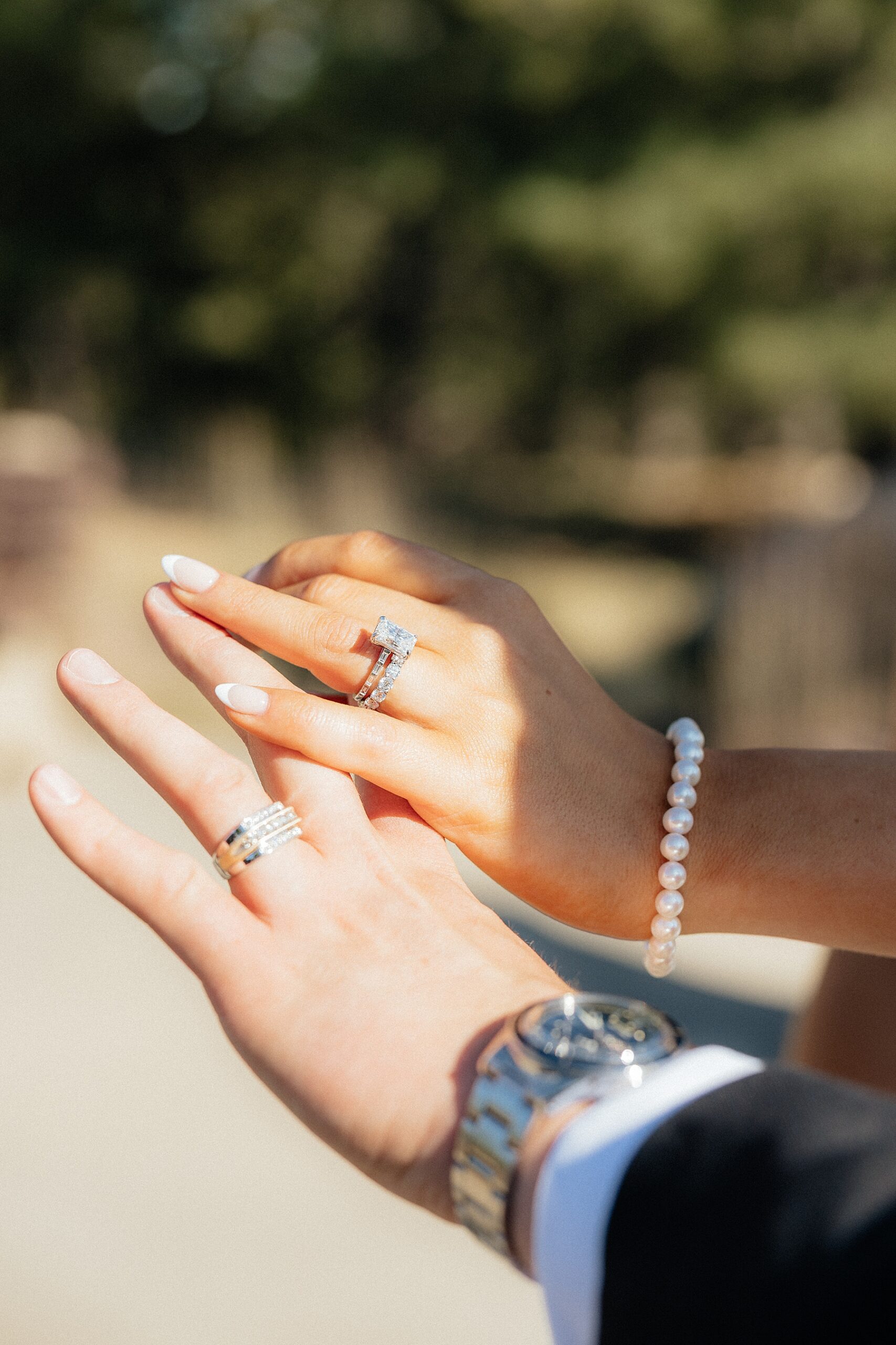 Diamond rings on a couple's elopement day.