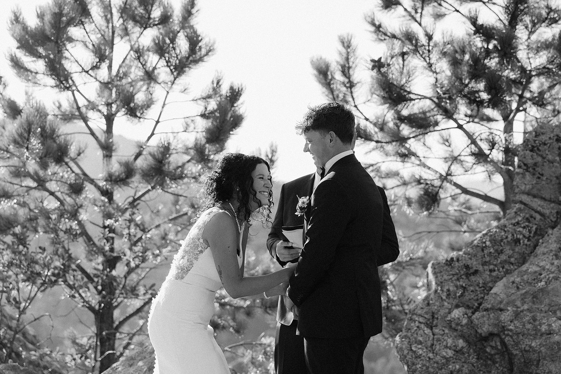 The bride laughing after she misspoke during her wedding vows.