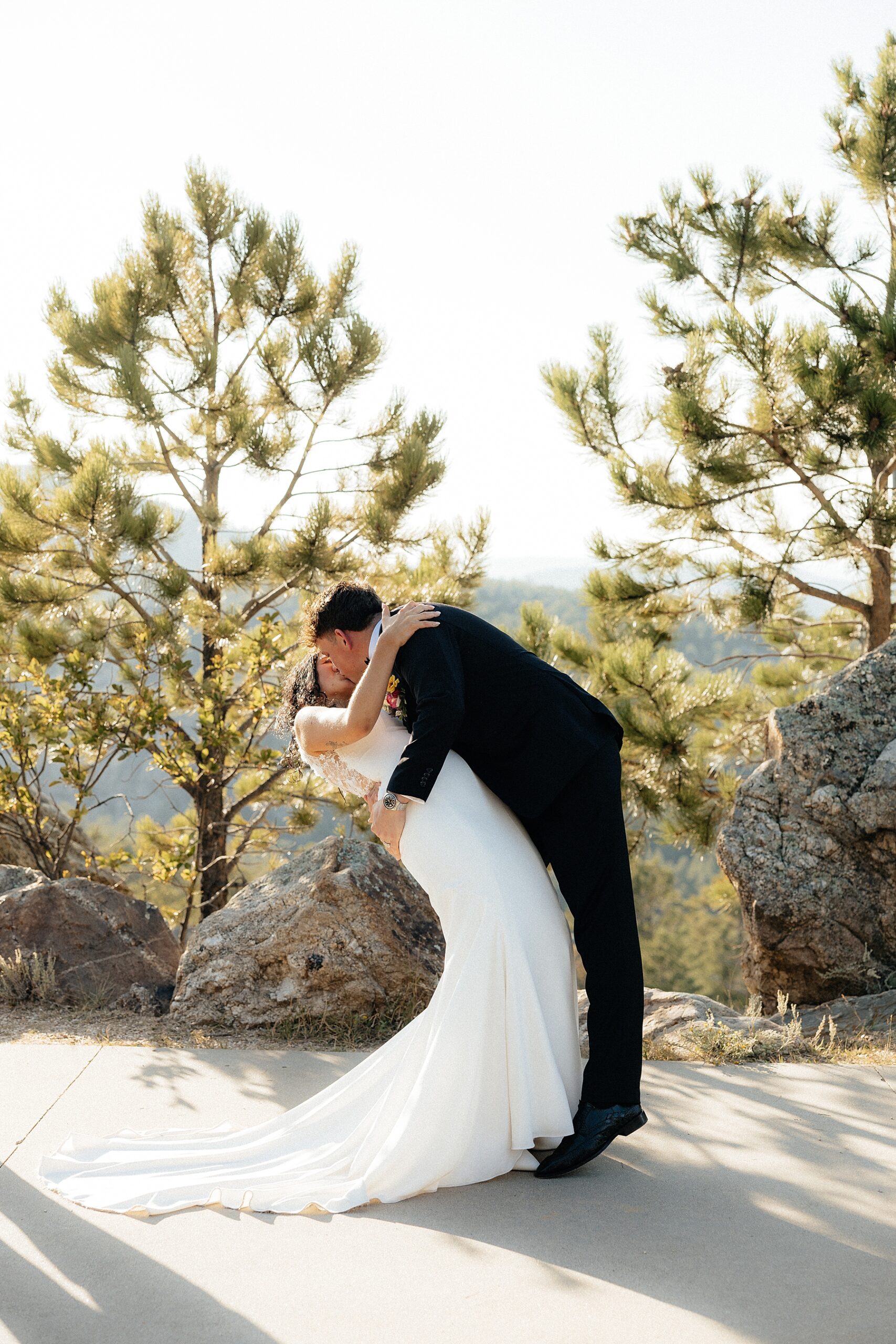 Couple kissing at their elopement ceremony.