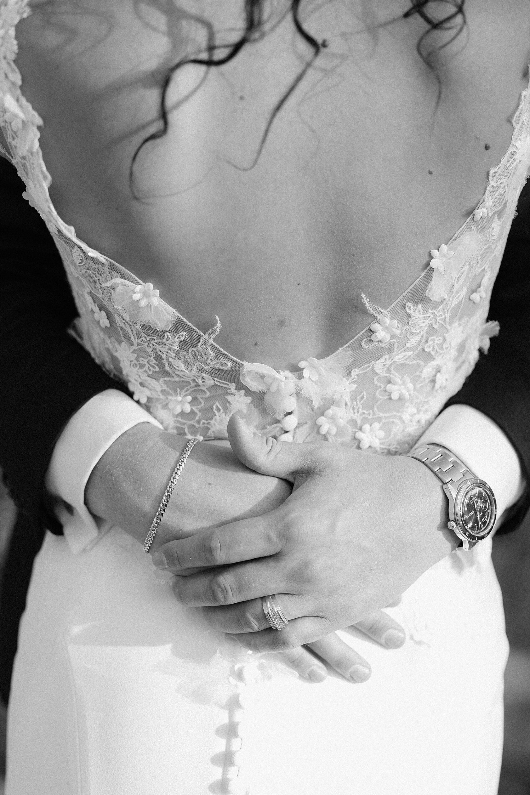 The groom holding his bride on their elopement day.