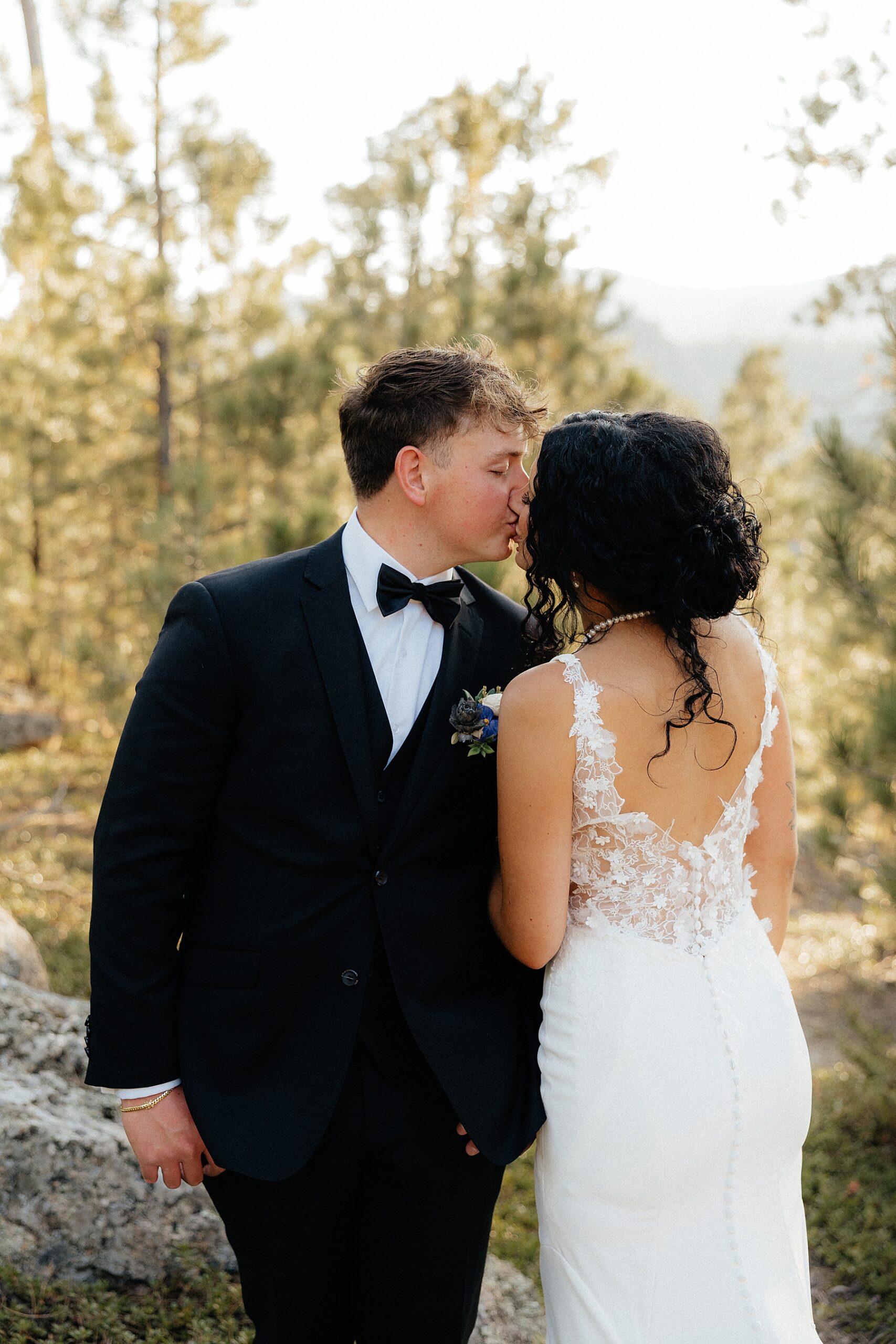The bride and groom kissing at the Black Hills elopement.
