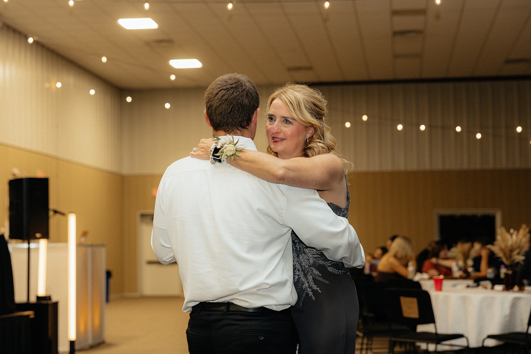 First dance at the reception with the groom and his mother.