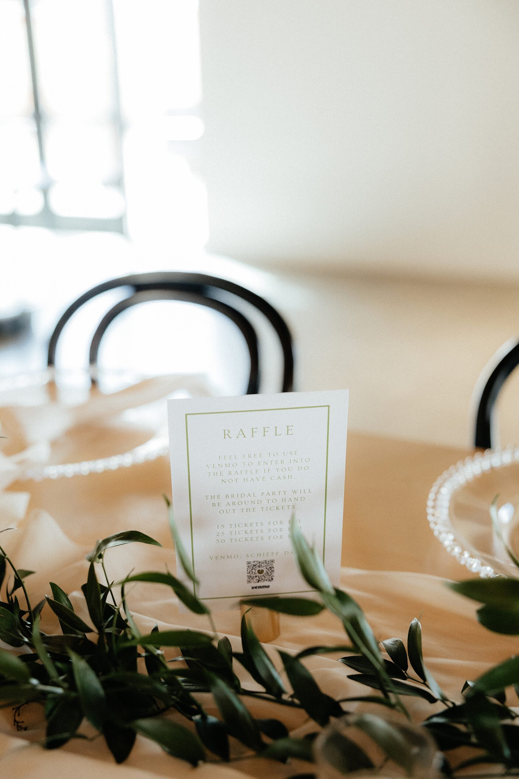 Wedding stationary set on the tables by a South Dakota wedding planner.