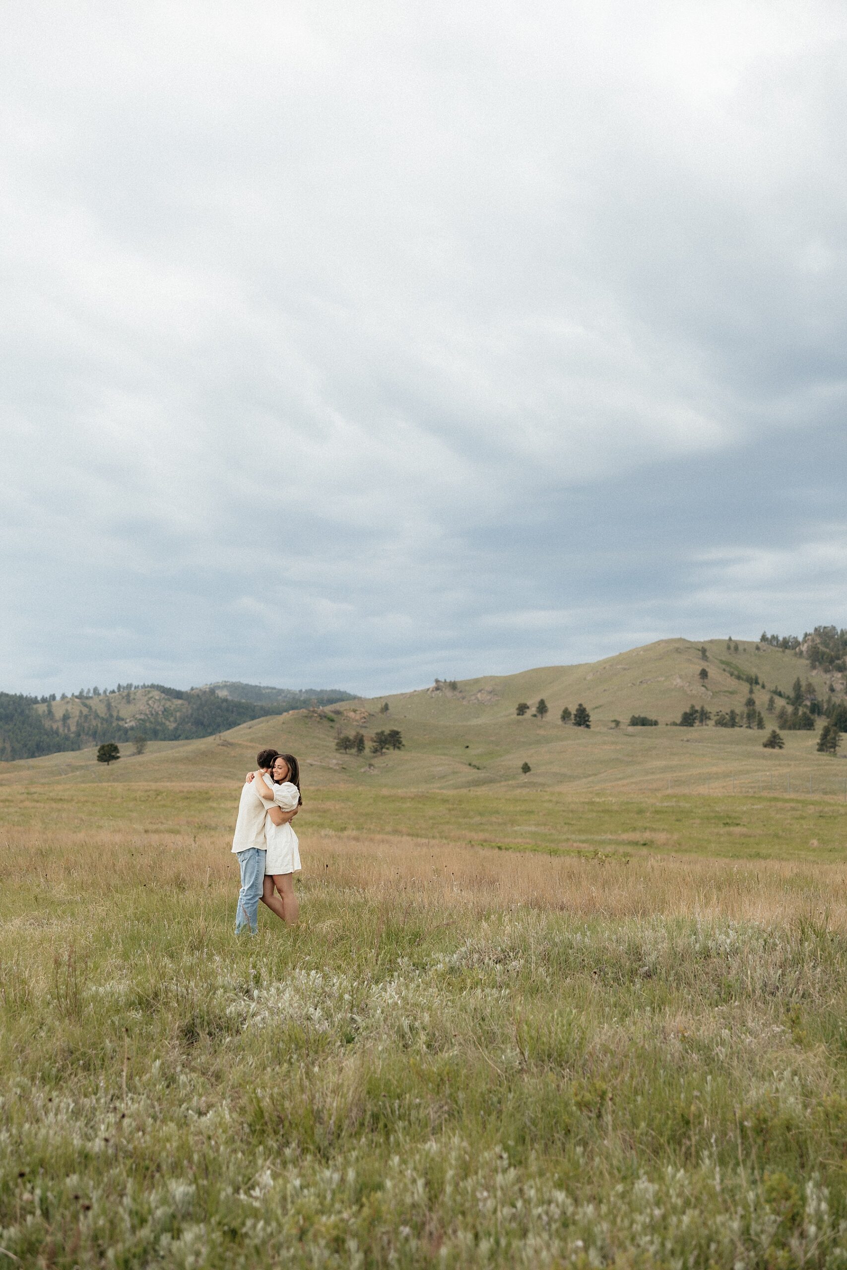 A couple hugging in Wind Cave National Park.