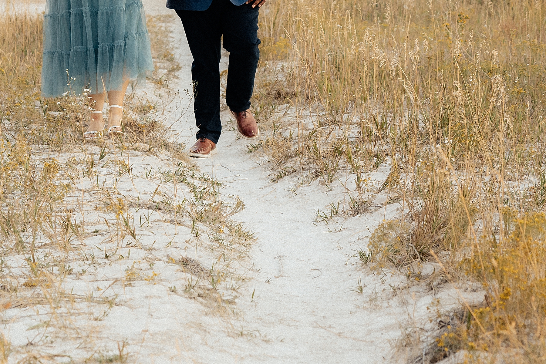 A couple walking near window trailhead in Badlands National Park.