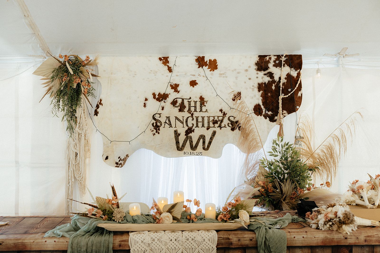 A cowhide with the couple's last name engraved in it.