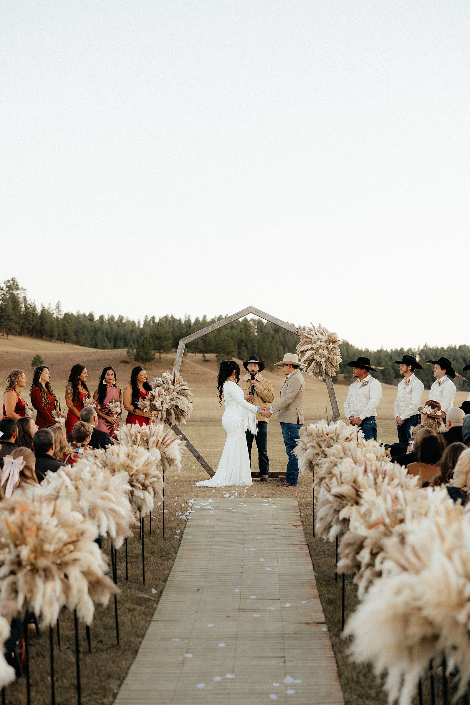 The bride and groom at the alter.