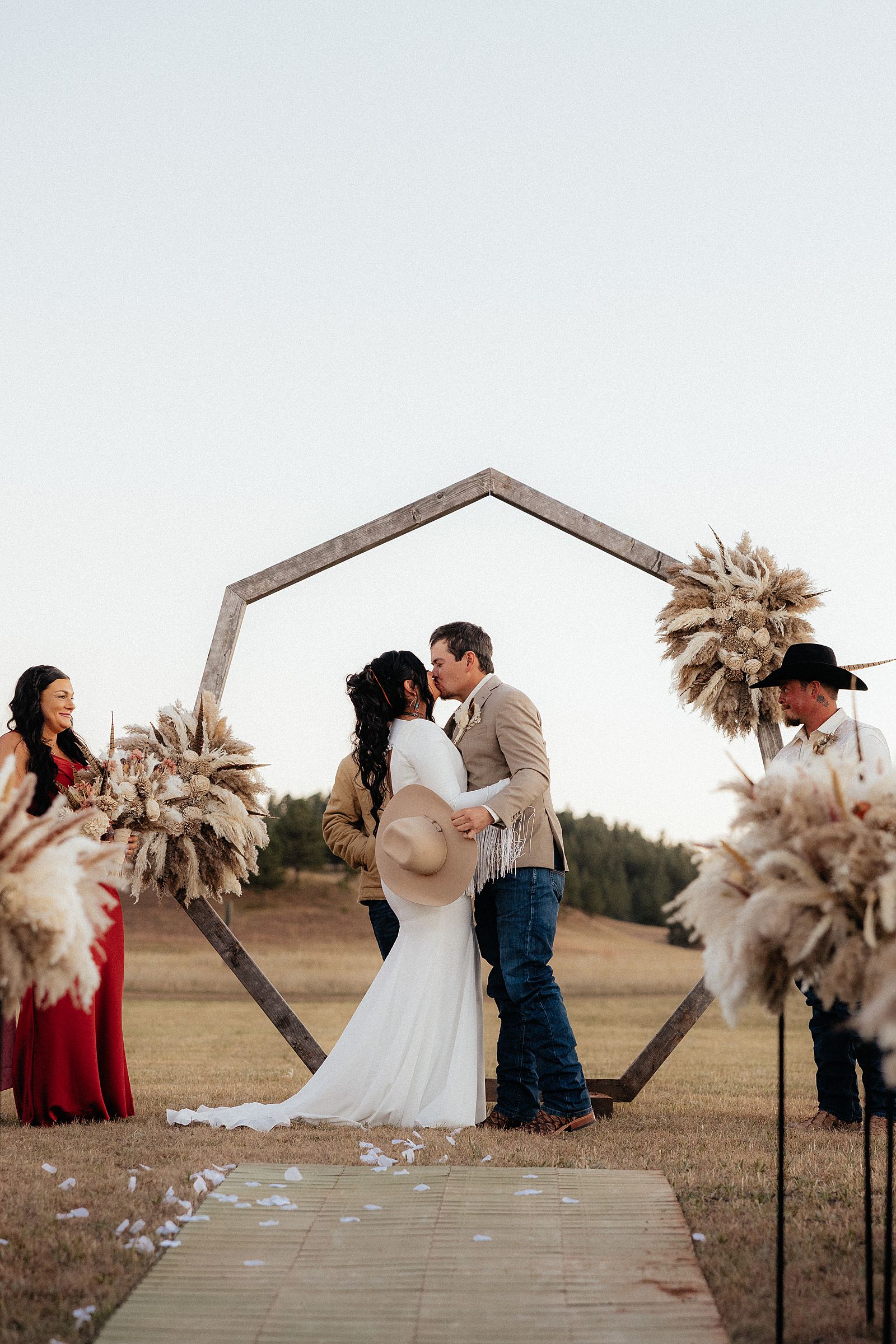 The bride and groom's first kiss as husband and wife at Battle Creek Camping Resort.