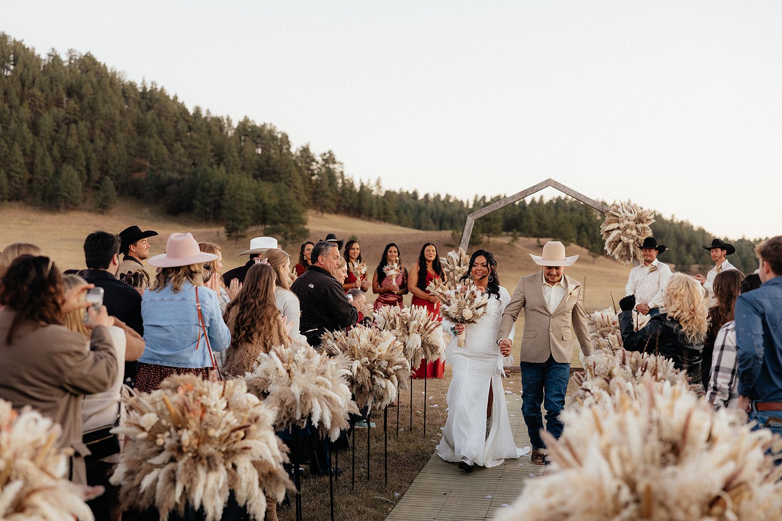The bride and groom walking back down the aisle.
