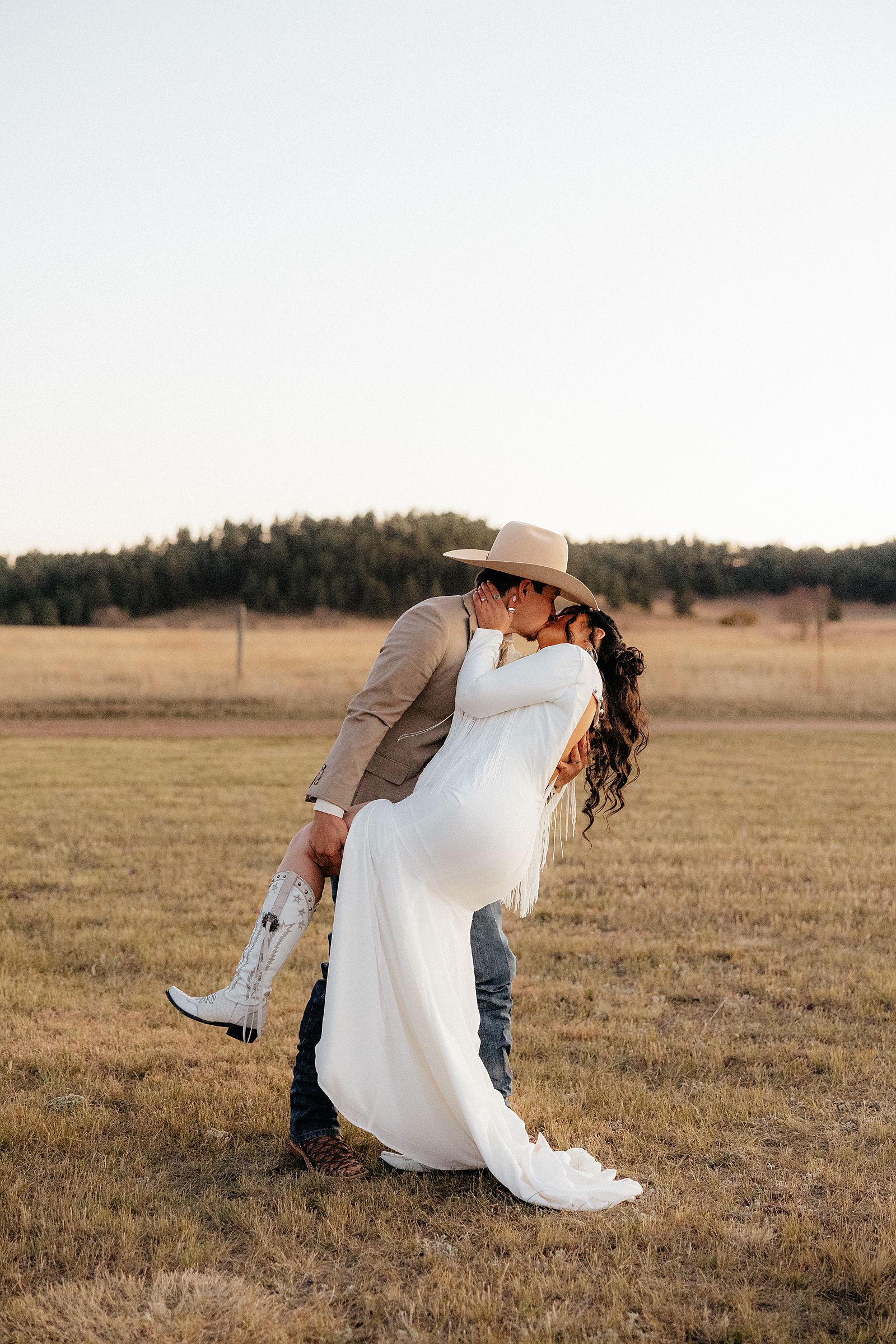The groom dipping the bride at their Battle Creek Camping Resort wedding.