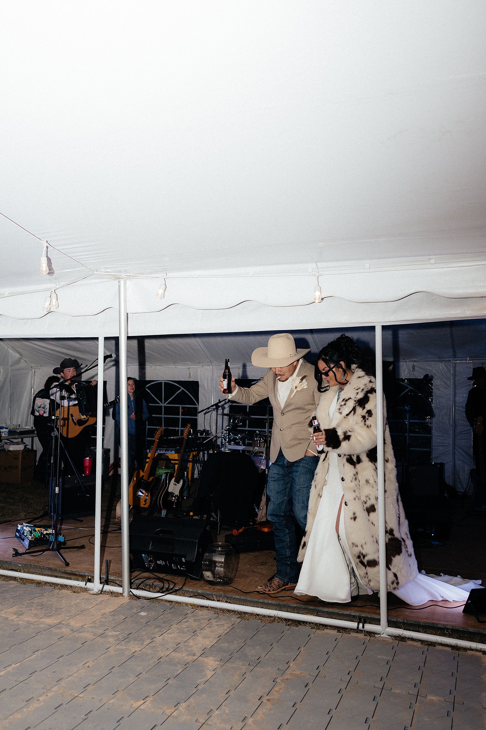 Bride and groom making their grand entrance at their Battle Creek Camping Resort wedding.