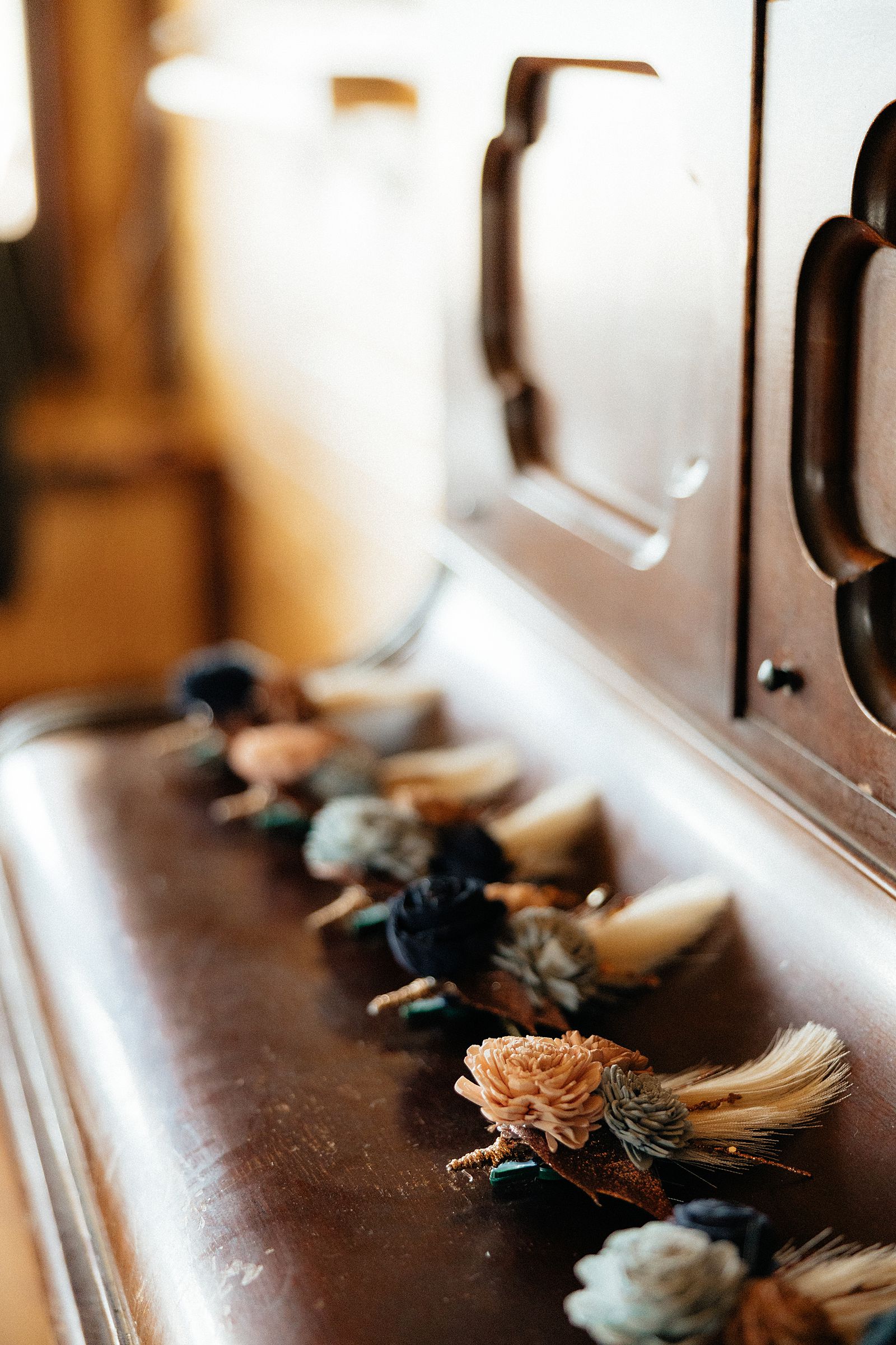Boutonnieres on a piano.