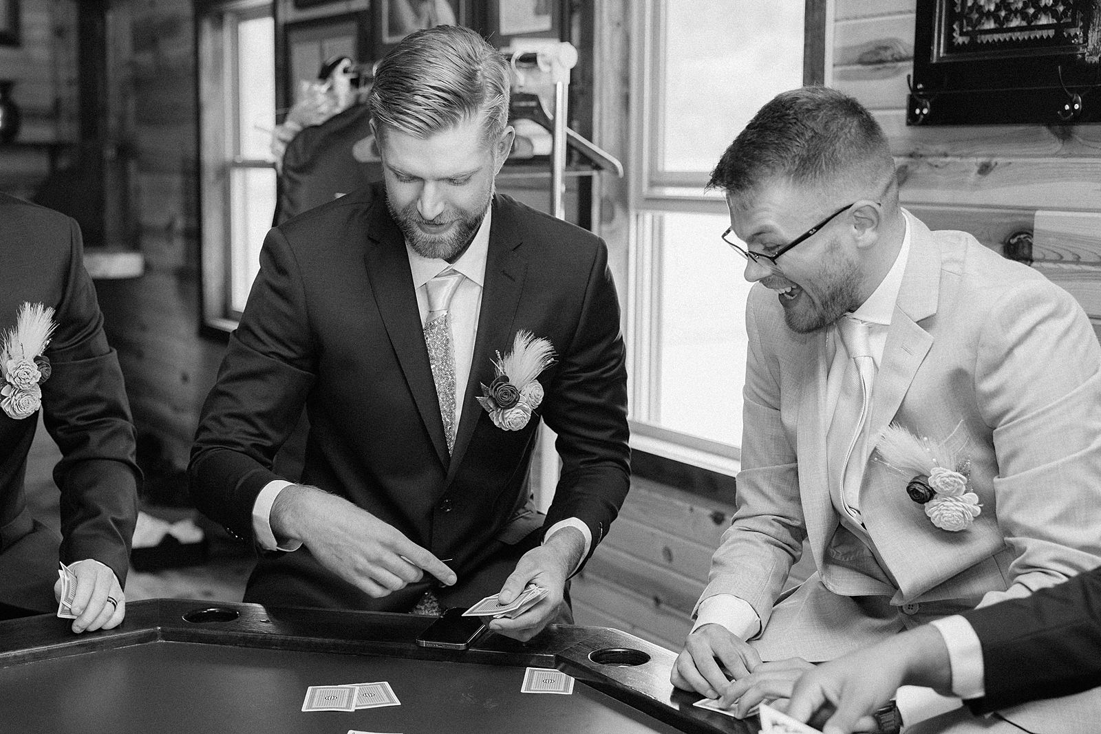 Groom and groomsmen playing poker.