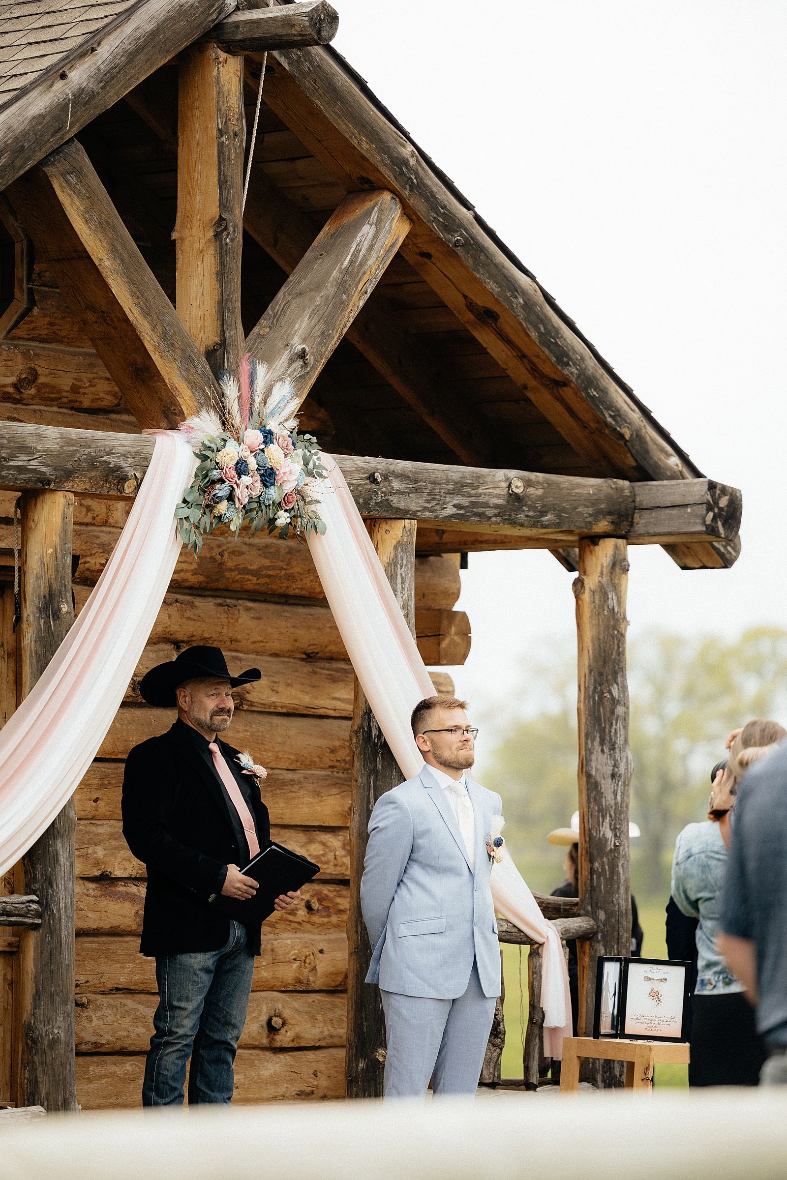 The groom waiting for his bride at the alter.