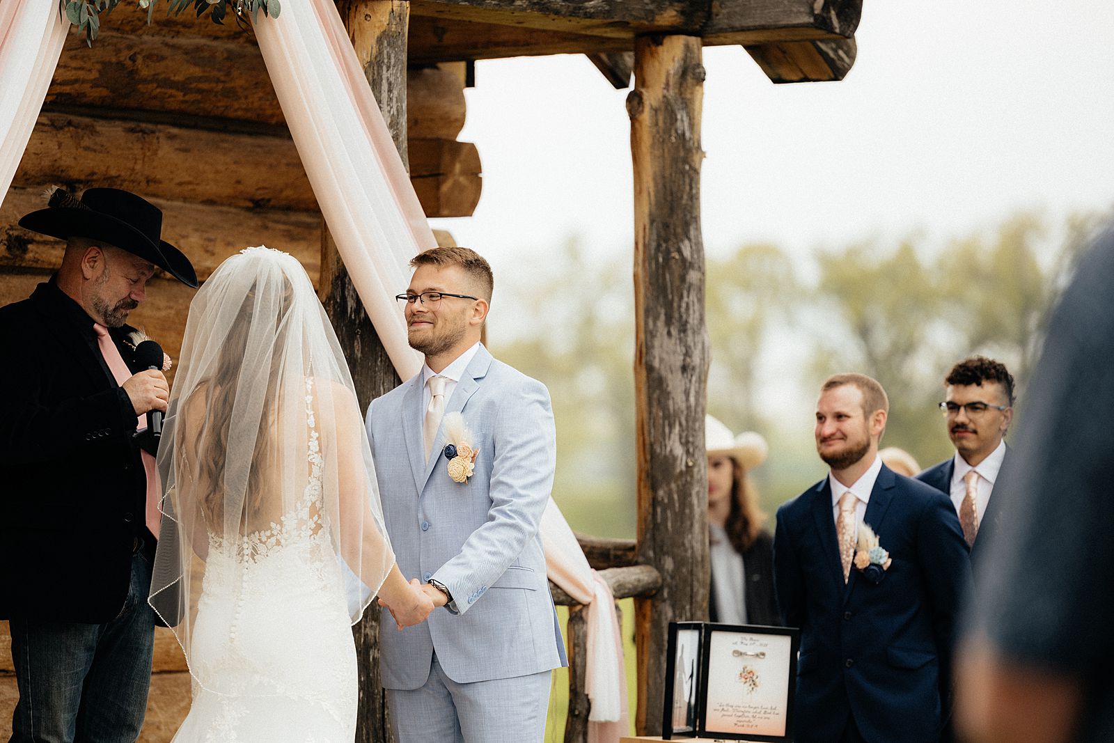 The bride and groom at the alter.