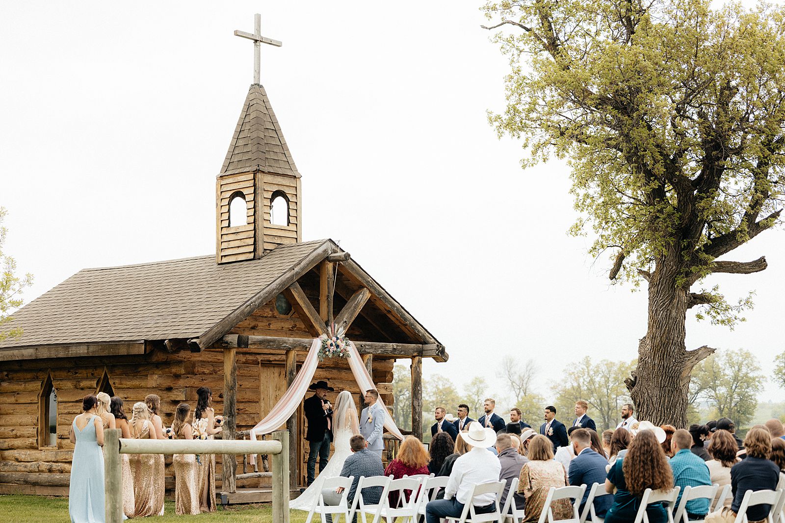 The bride and groom standing at the alter at their Black Hills wedding.