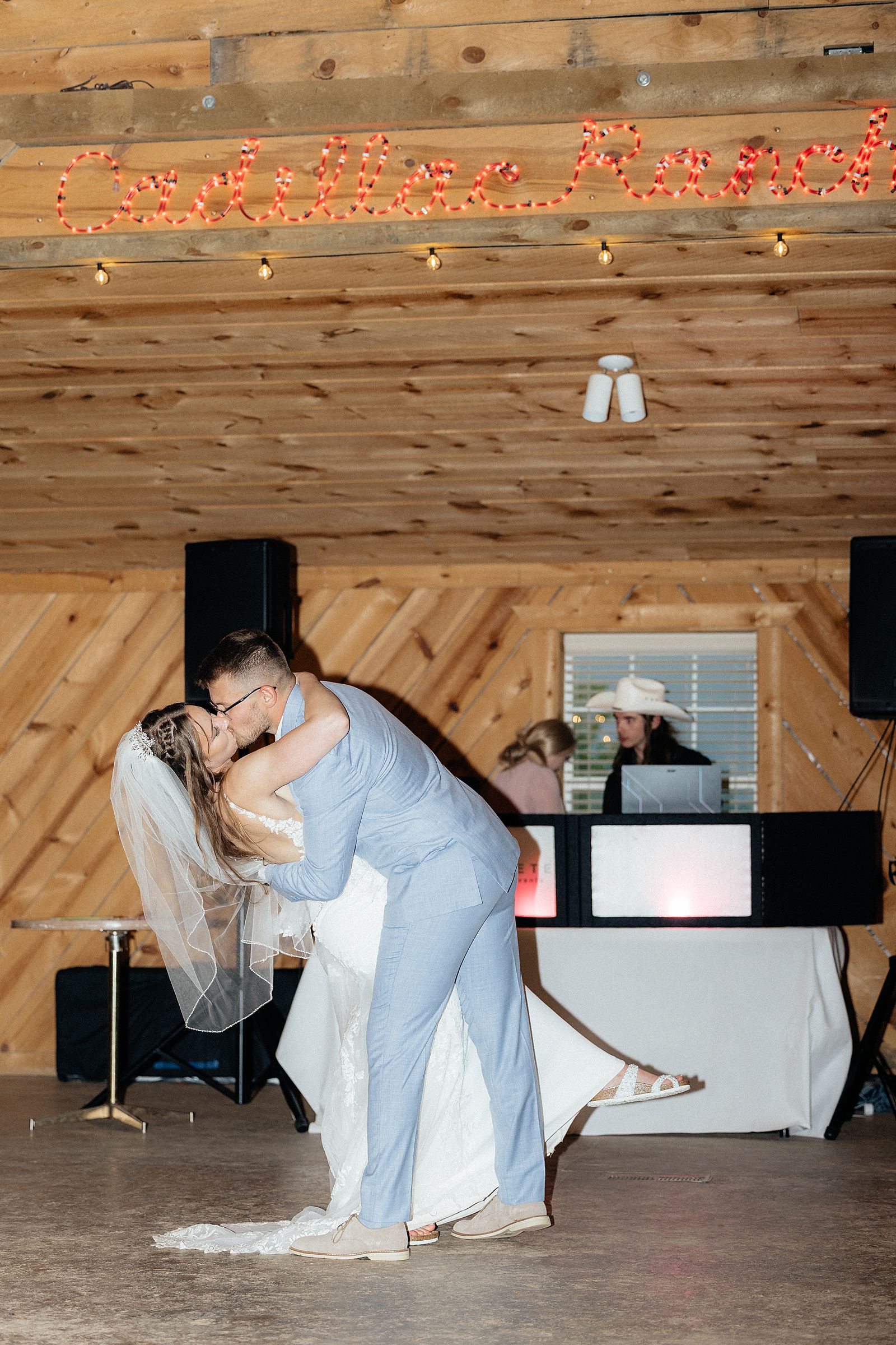 The groom dipping his bride during their first dance.