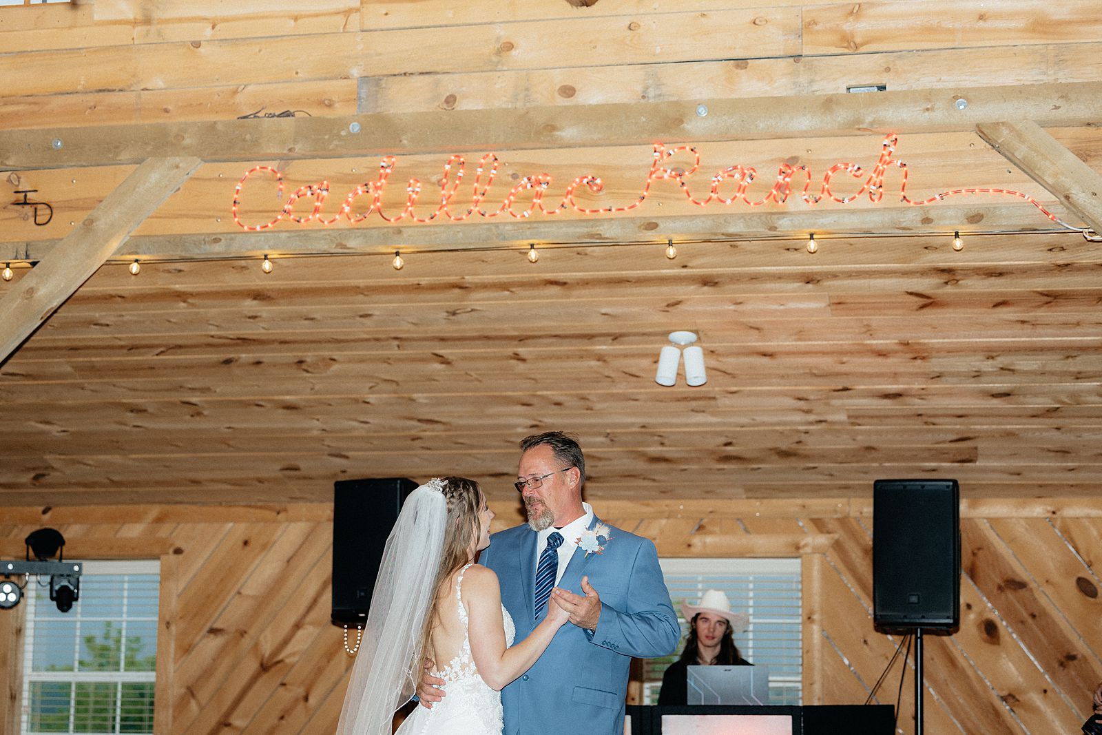 The bride dancing with her father.