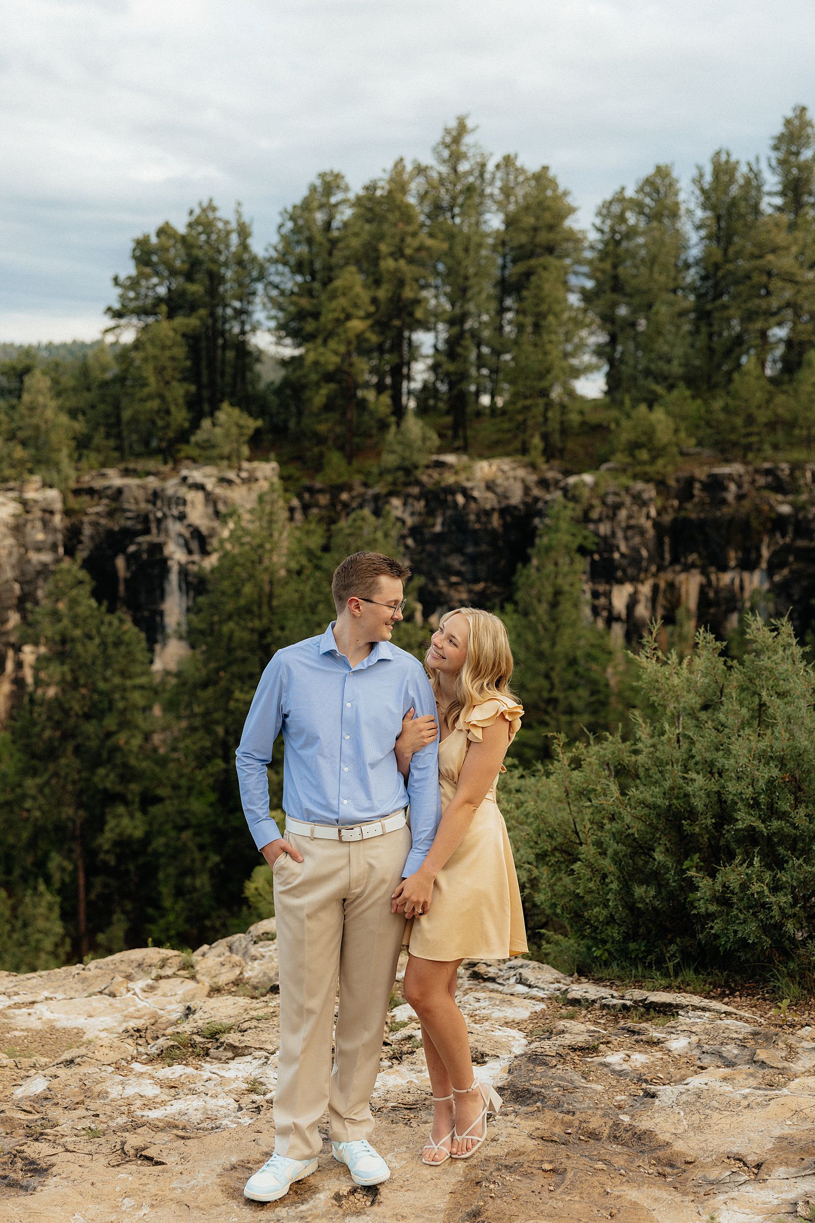 The couple looking at each other during their session.