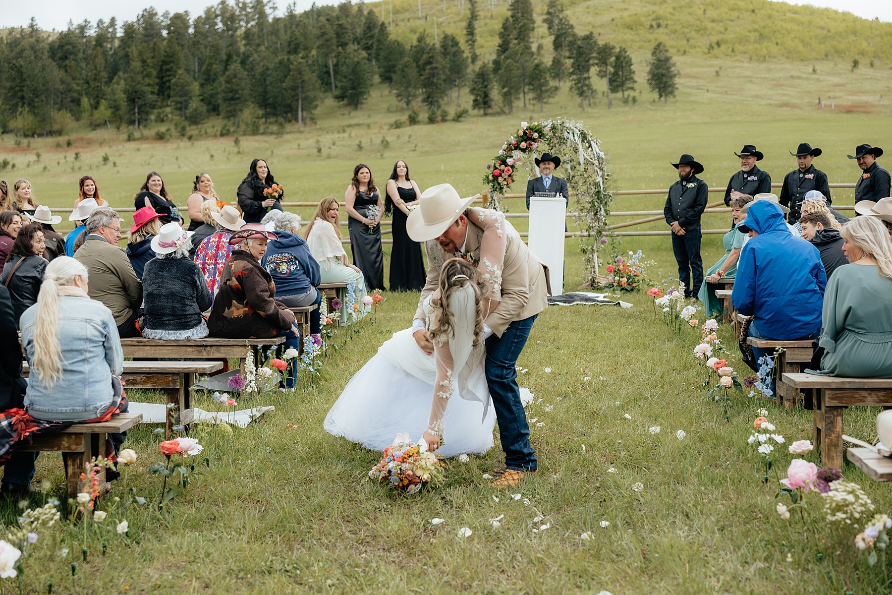The groom dipping the bride and almost dropping her.