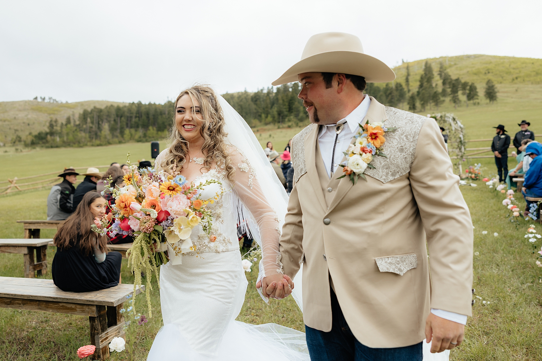 The bride and groom walking back down the aisle.