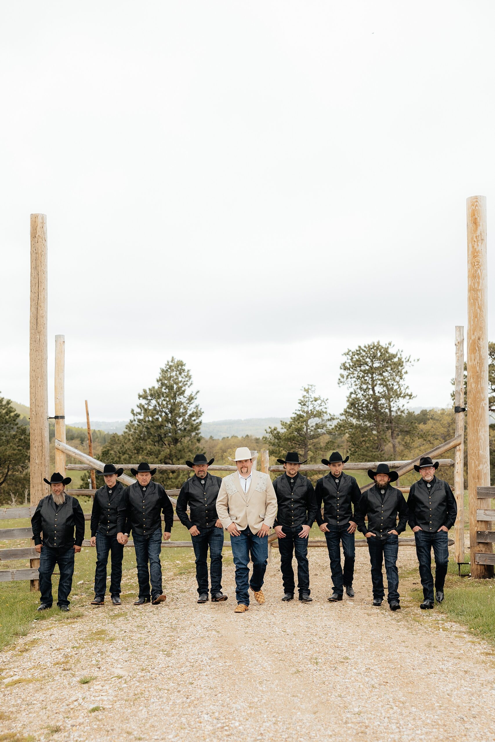 The groom and his groomsmen in western attire.