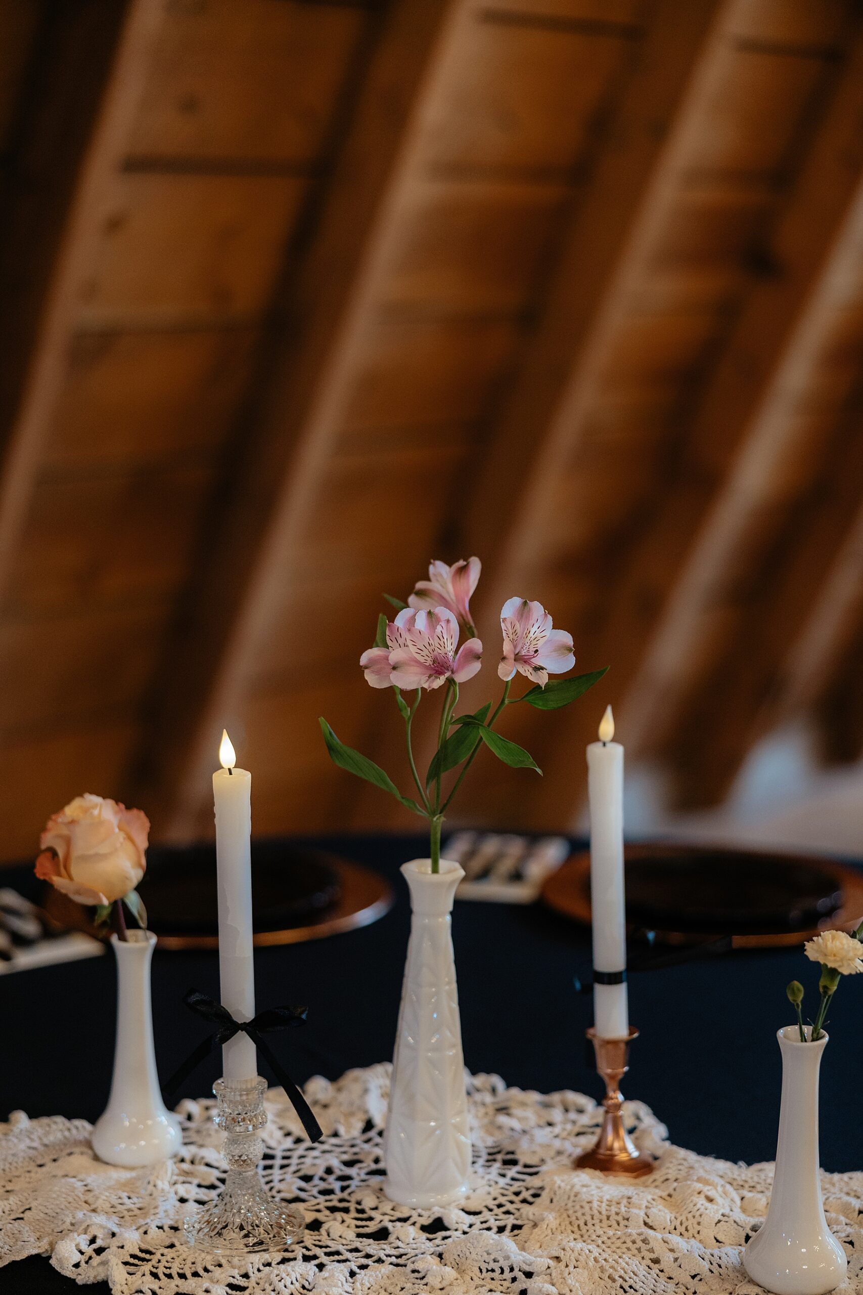 A black and white wedding table setting.