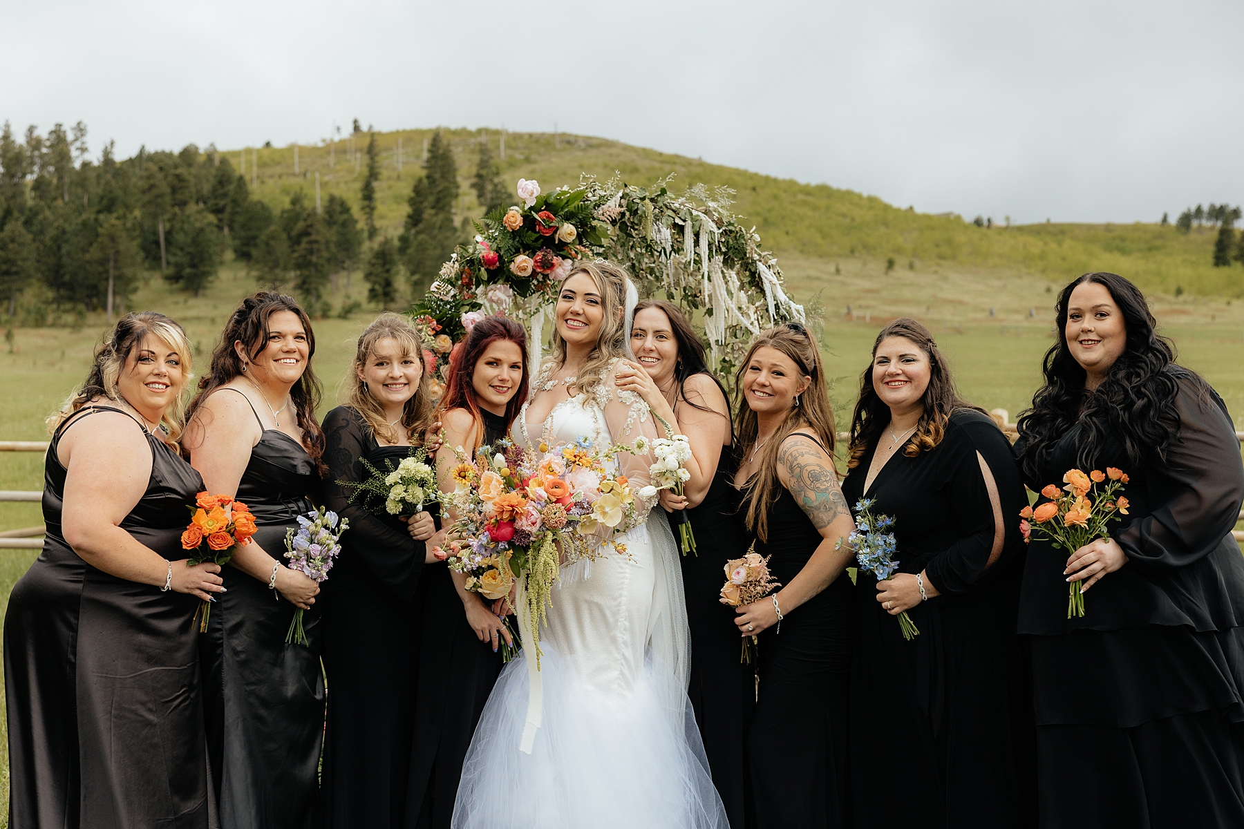 Bridesmaids surrounding the bride at a Black Hills Wedding.