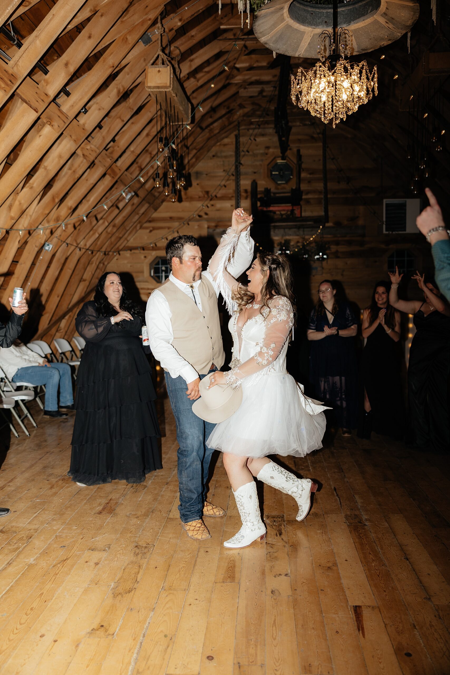 The bride and groom dancing.