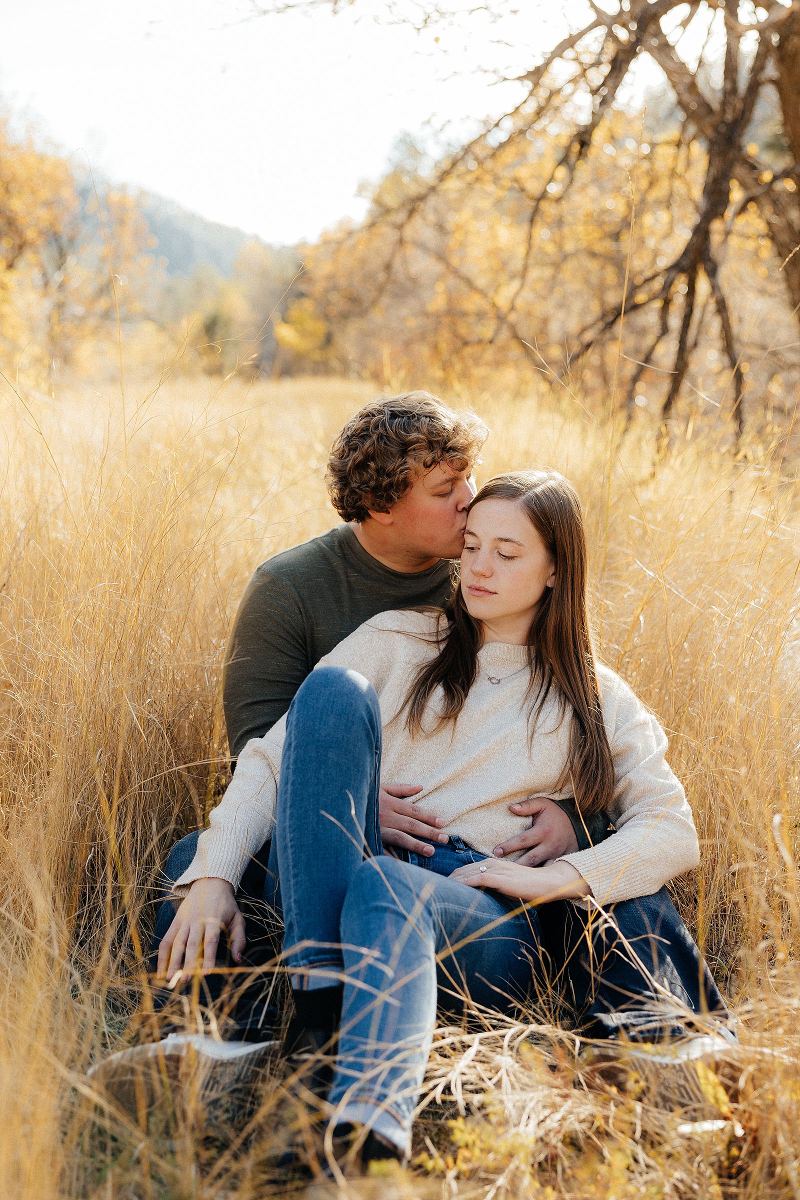 Parker kissing Hannah's temple in Spearfish, South Dakota.