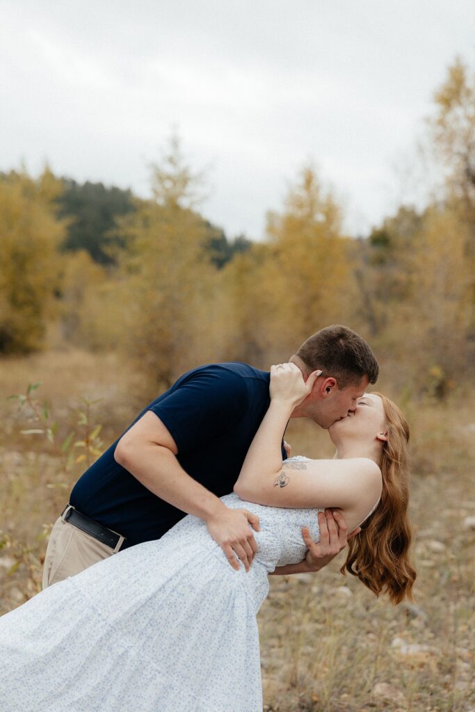 Warren dips Olivia at their engagement session.