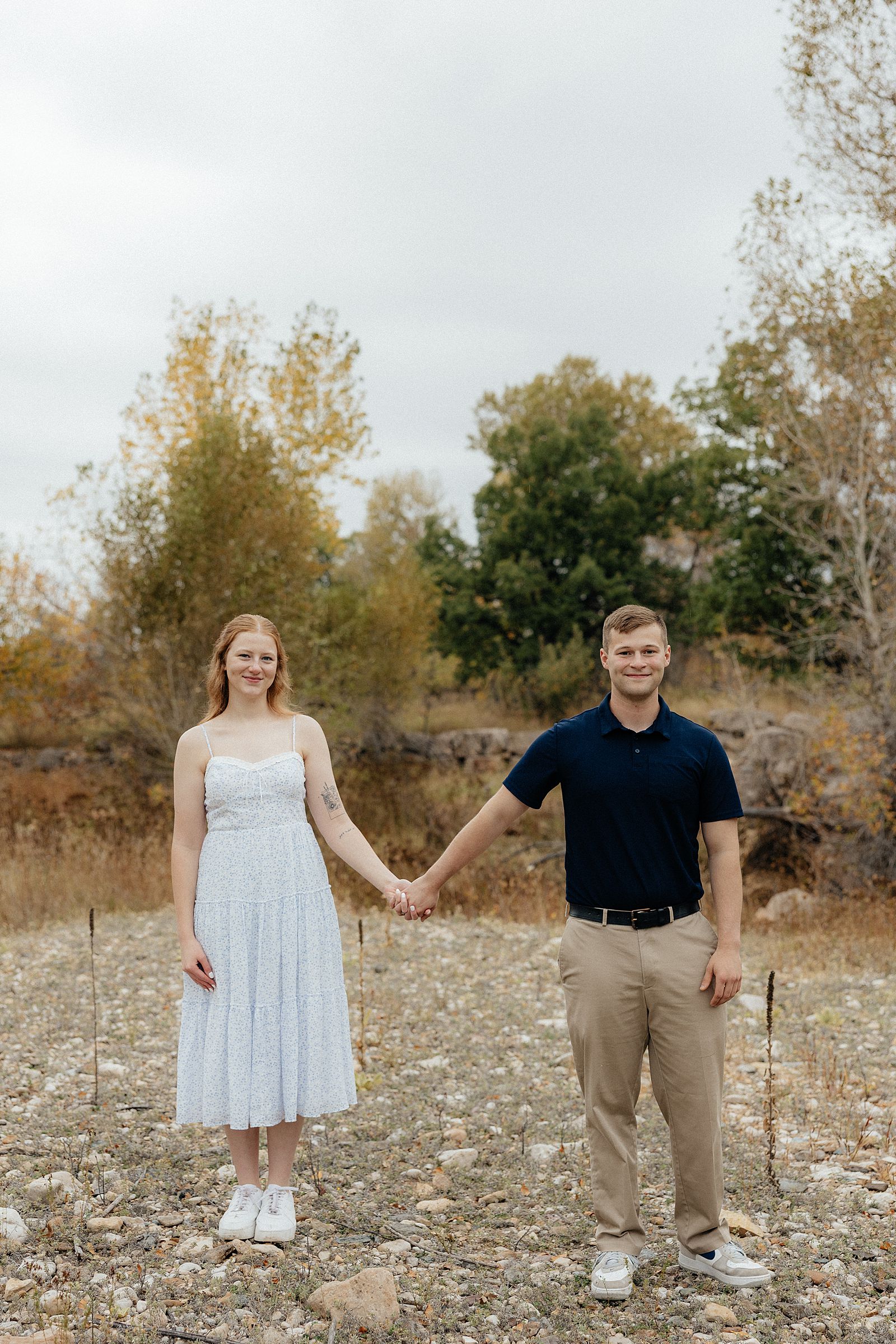 Olivia and Warren smiling at the camera.
