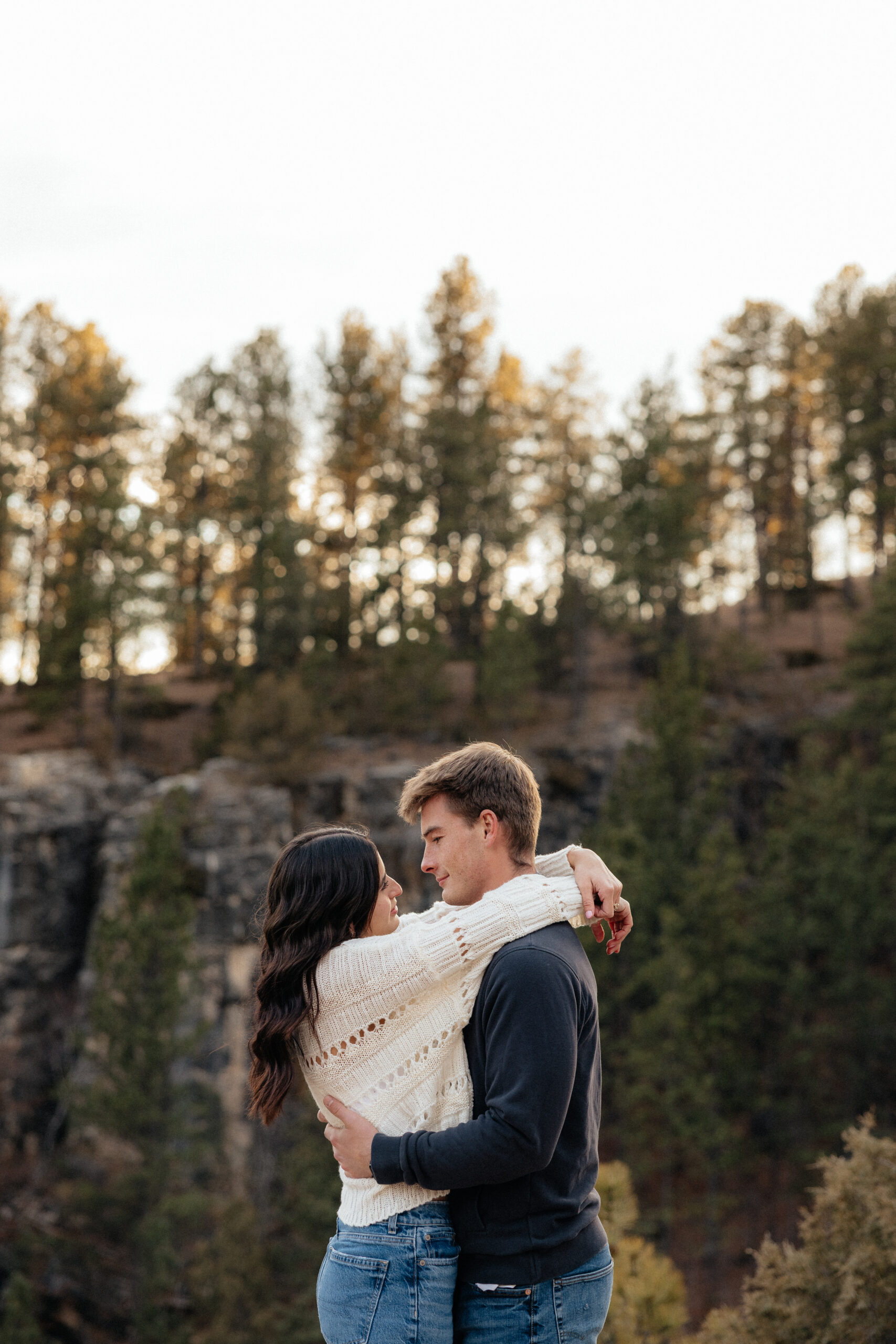 A couple looking at each other during their Rapid City engagement session.