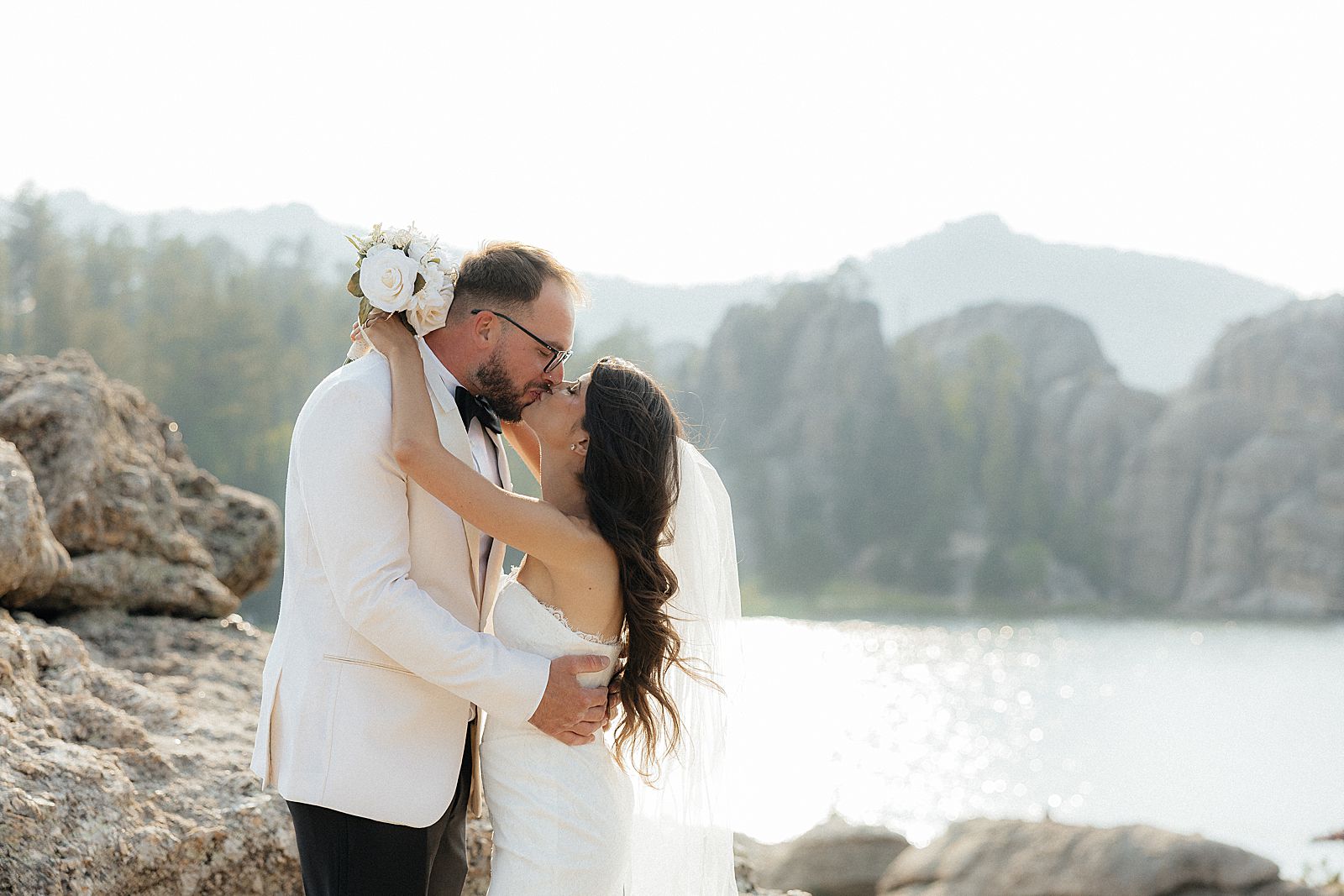 Romantic wedding portraits overlooking Sylvan Lake in the Black Hills